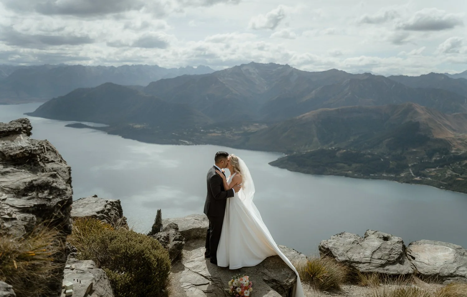 cecil-peak-heli-elopement-first-kiss.jpg