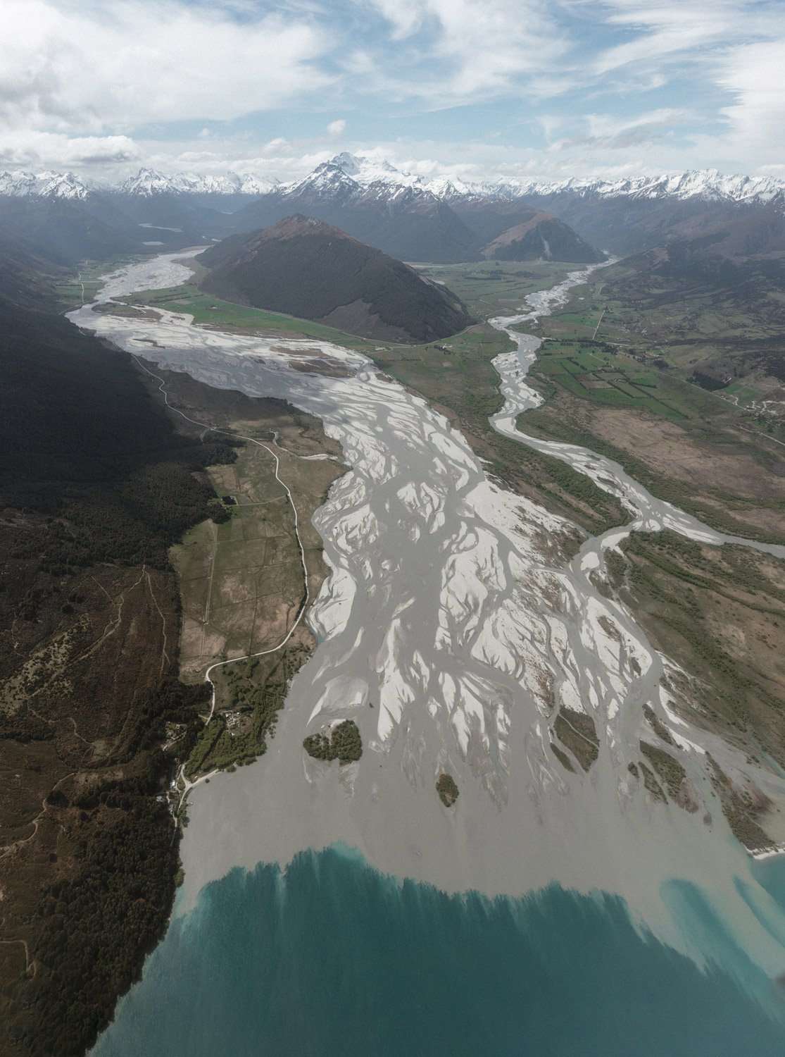 The Dart River where it meets Lake Wakatipu in Glenorchy, Queenstown, New Zealand. And ideal spot for your heli elopement. 