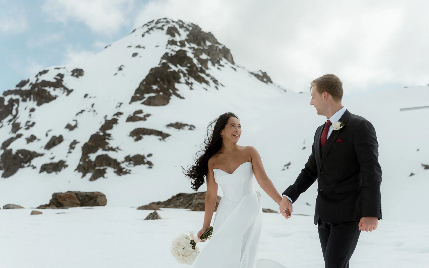 heli wedding on glacier in Queenstown at the humboldts mountains
