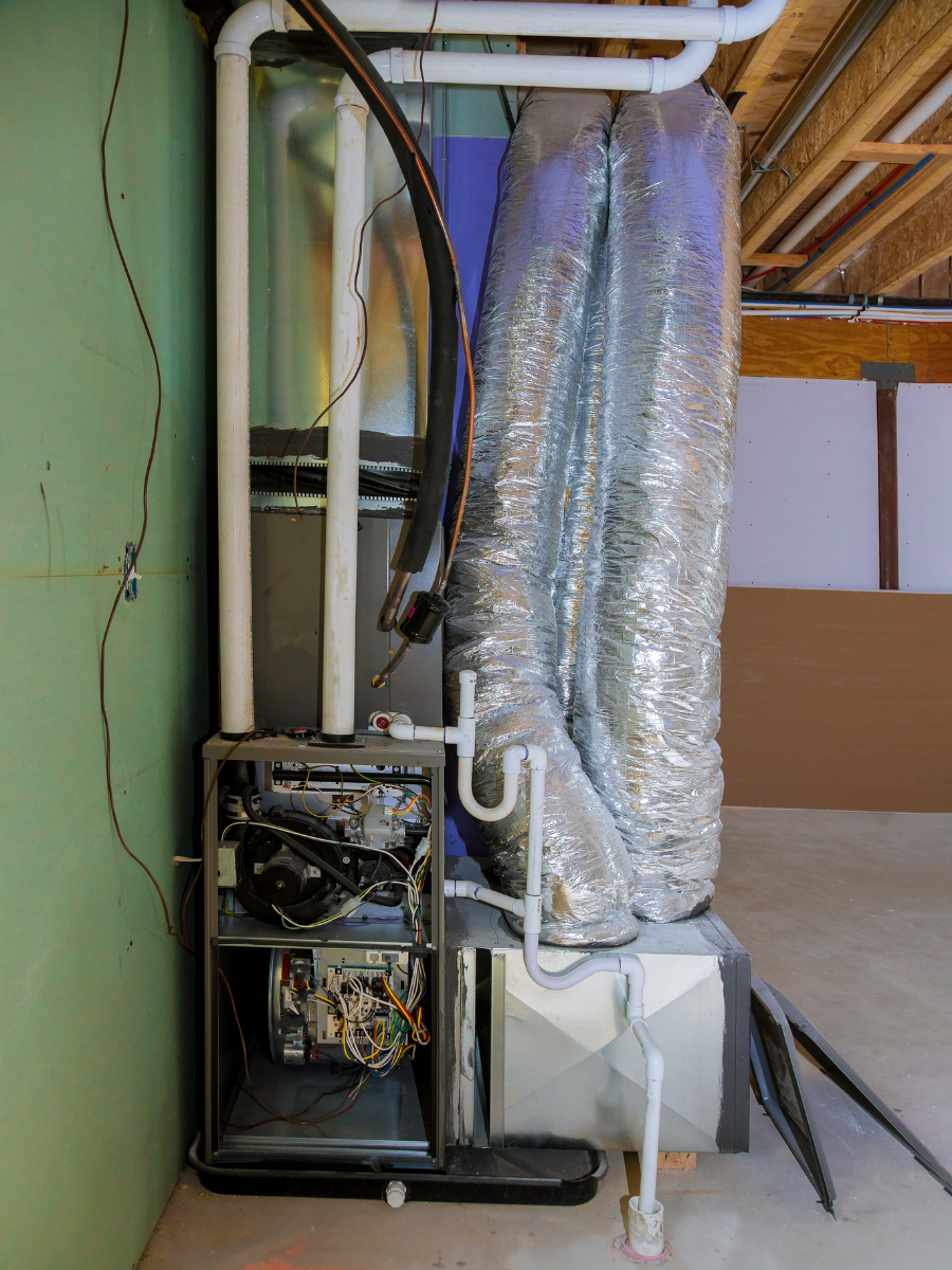 High-efficiency furnace installation with insulated ductwork by Carmel Valley Heating and Sheet Metal Inc.