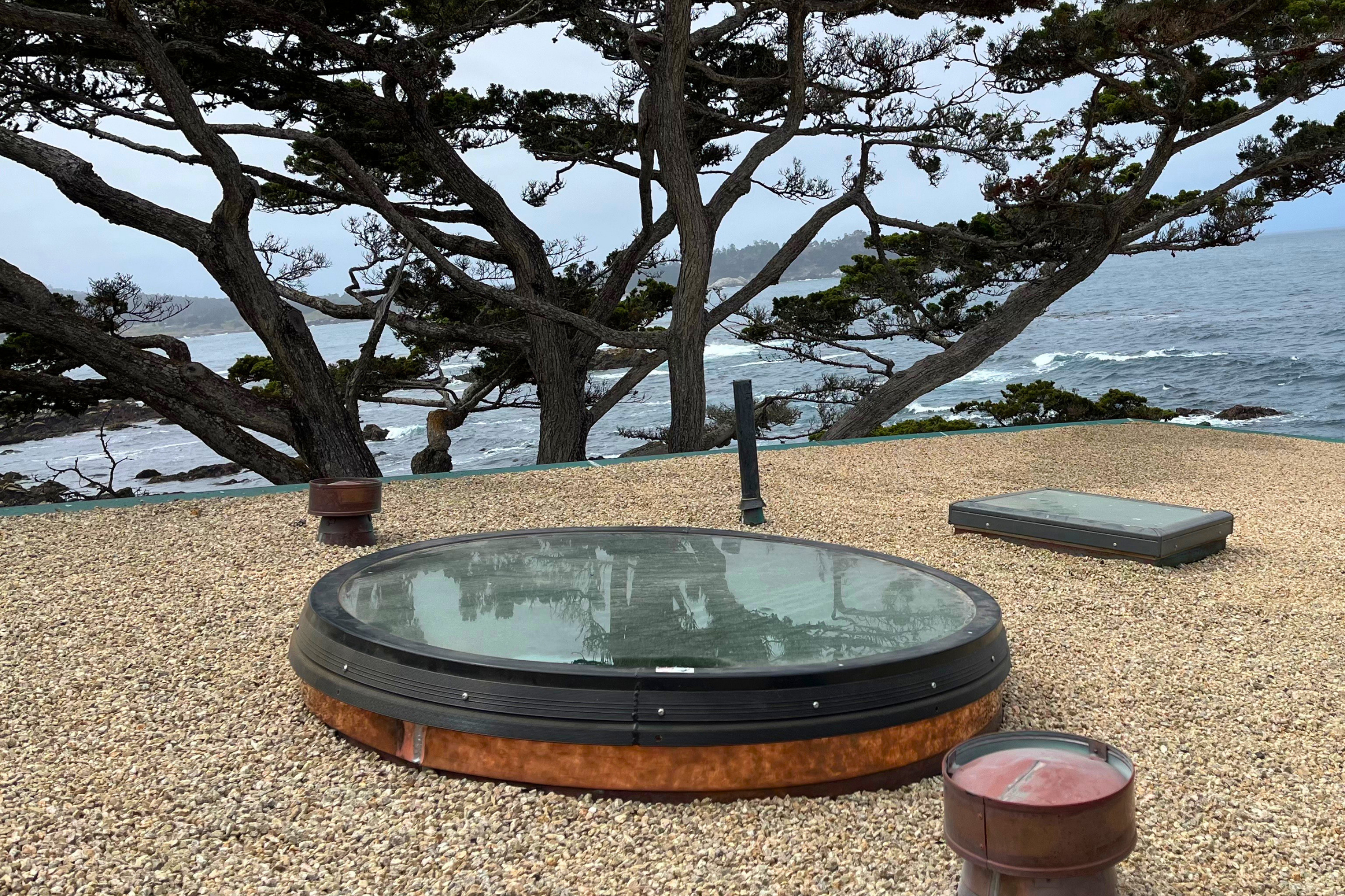 Custom round skylight installed on a coastal home overlooking the Pacific Ocean in Carmel Valley California