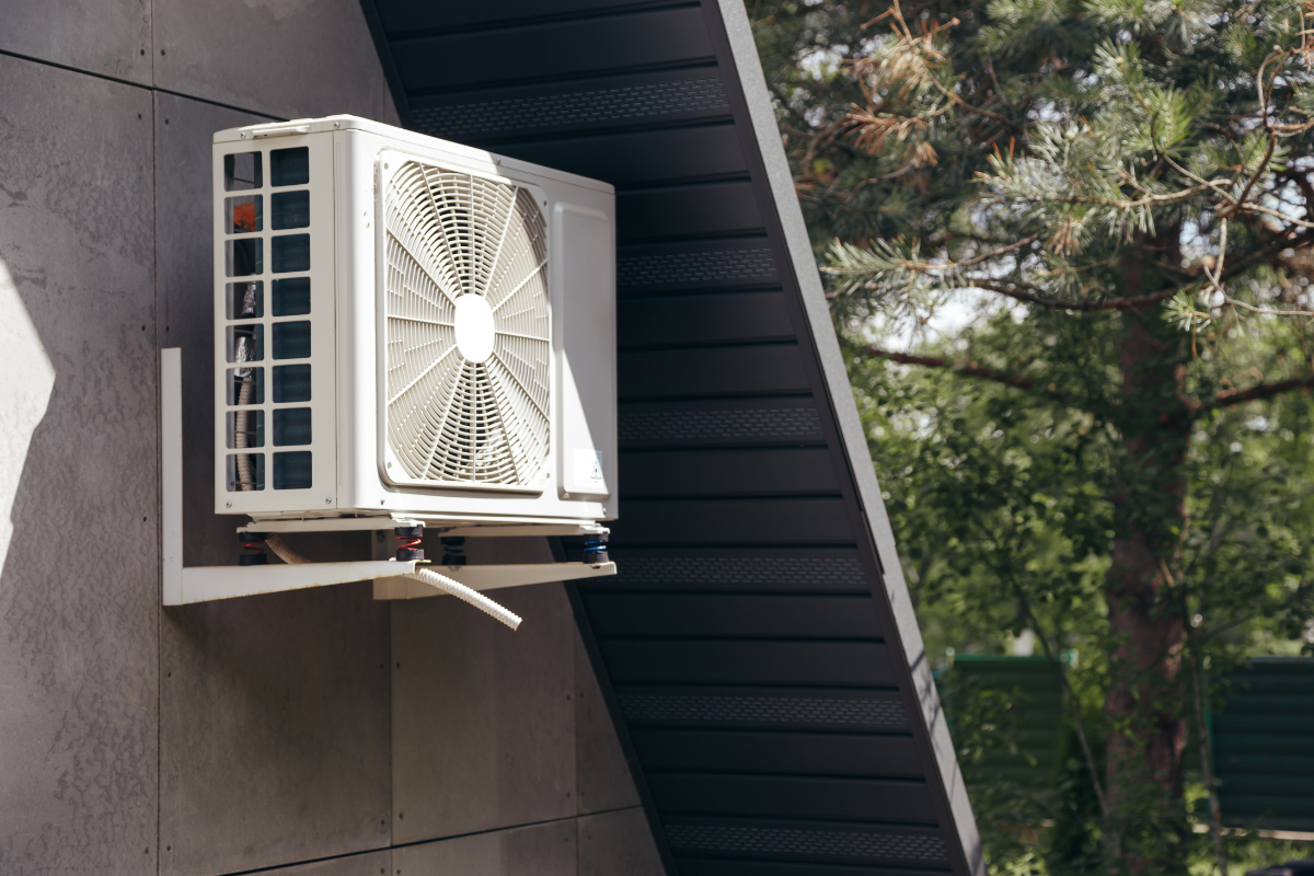 Outdoor mini split HVAC unit mounted on a residential home in Carmel Valley California