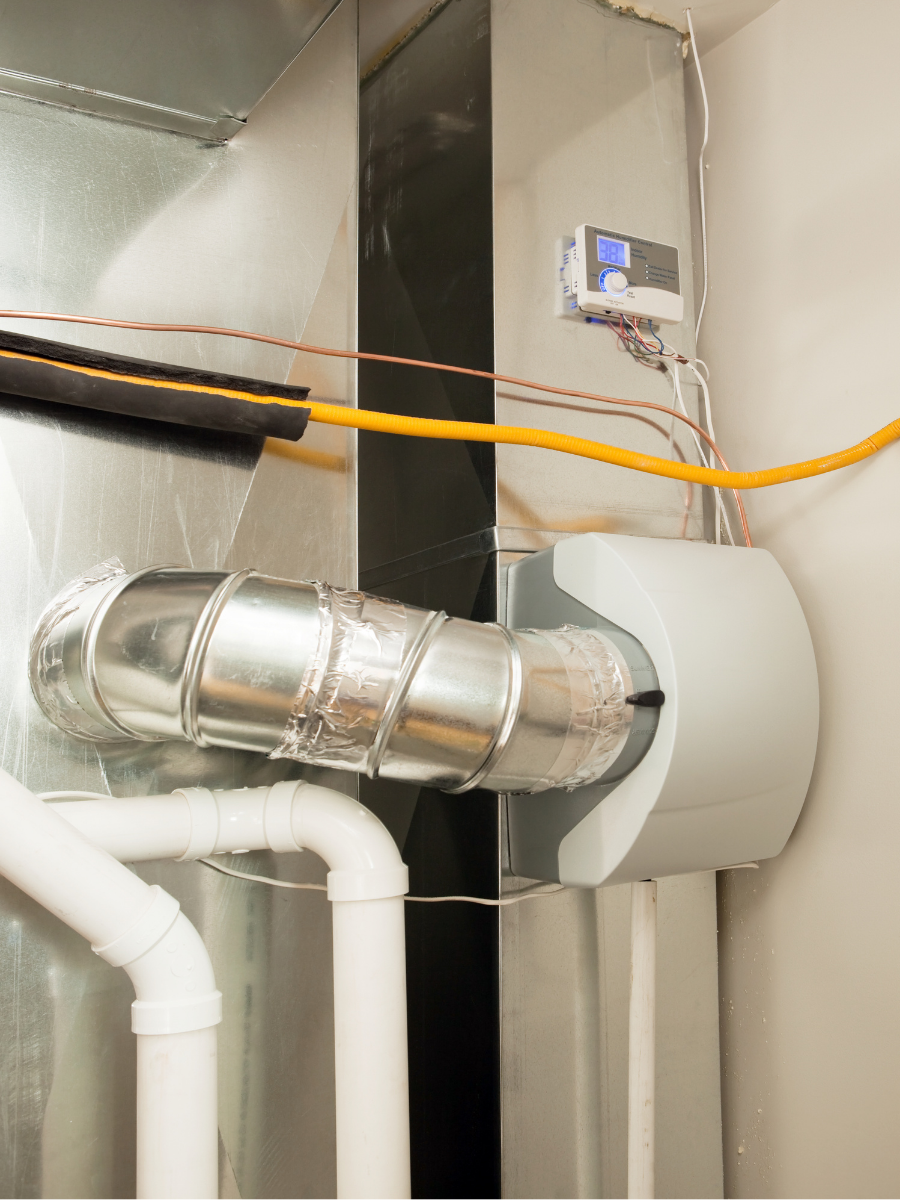 Residential gas furnace with venting and utility connections