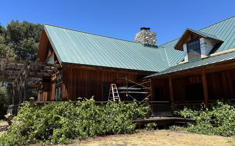Custom standing seam metal roofing installed on a residential home in Carmel Valley, CA