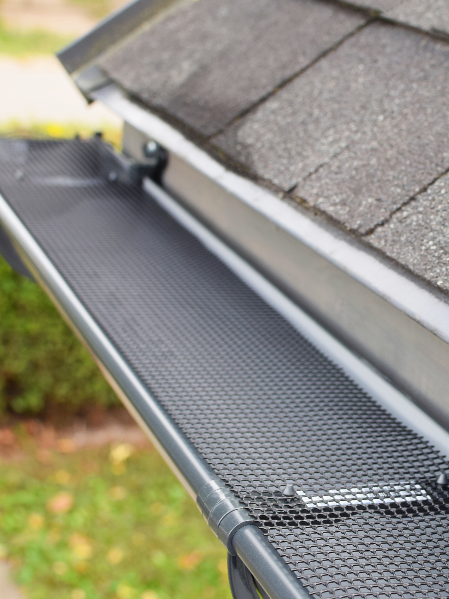 Gutter screen installed to reduce debris and support drainage
