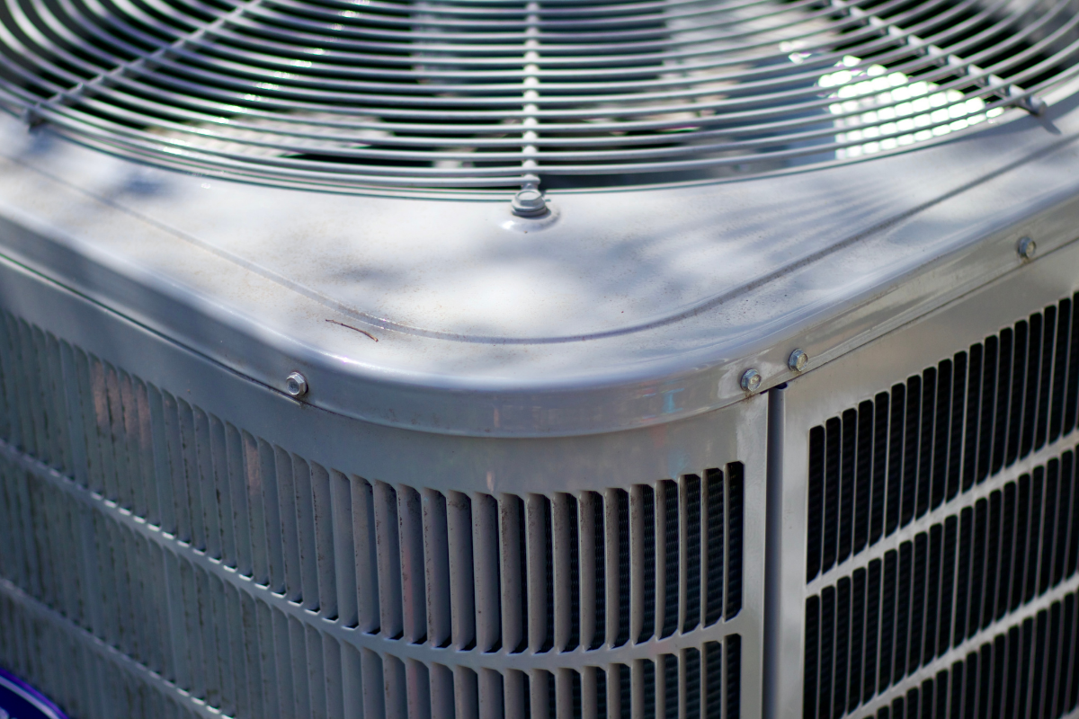 Close up of a residential HVAC condenser unit providing heating and cooling in Carmel Valley California