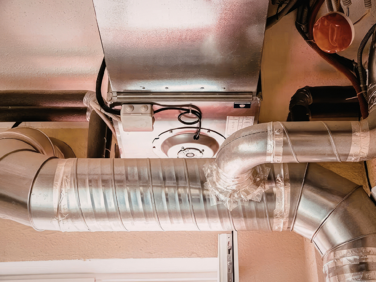 Residential HVAC ductwork connected to an indoor air handler in a California home