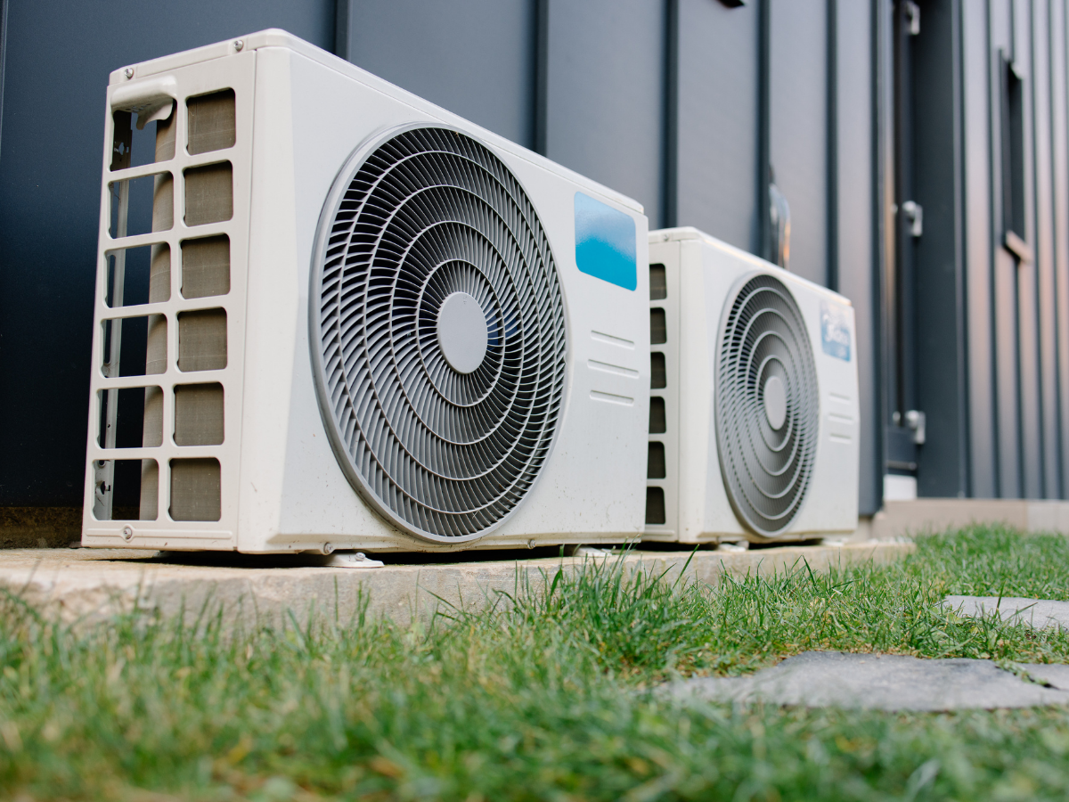 Outdoor air conditioning units installed beside a residential building