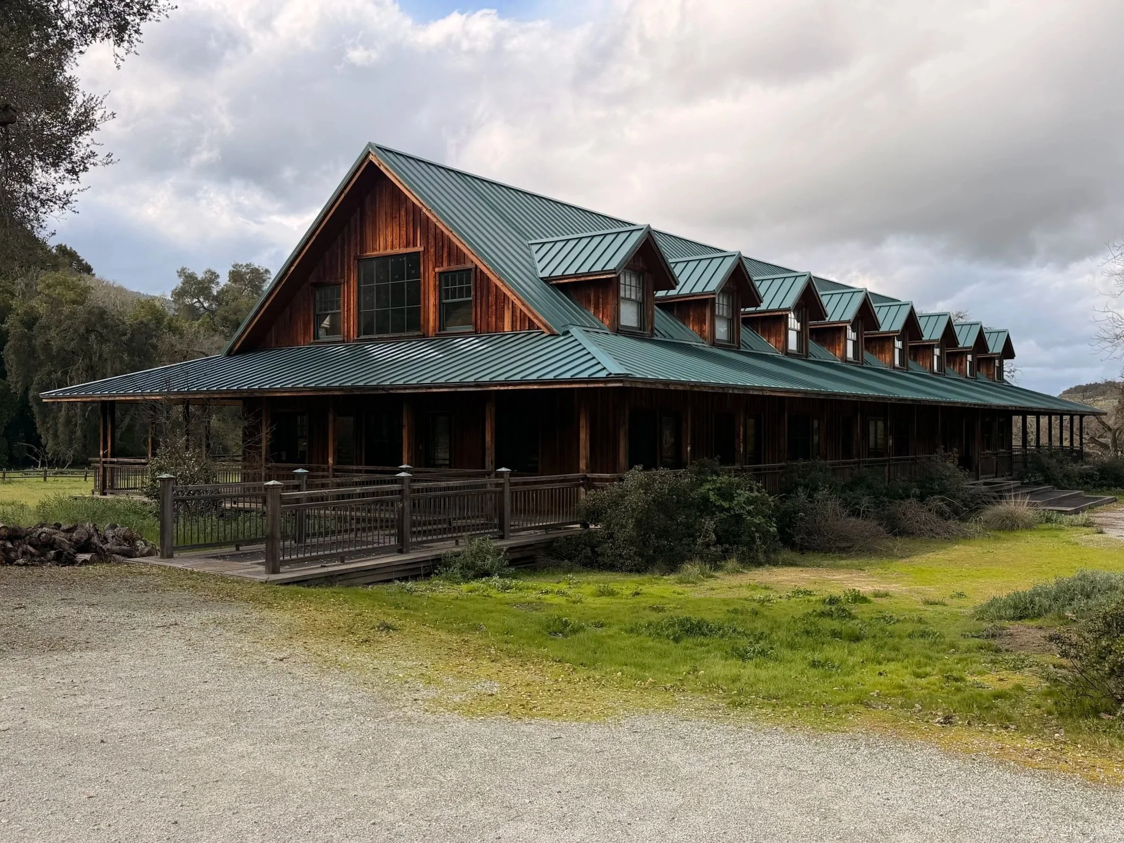 Standing seam metal roof installation on a custom residential home in Carmel Valley California