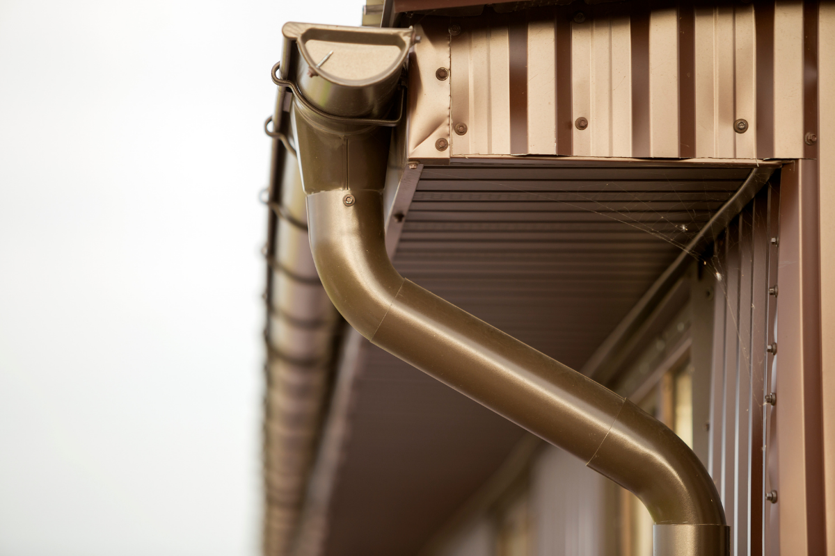 Custom seamless gutter and downspout installation on a residential property in Carmel Valley California