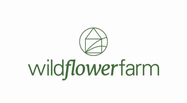 Wildflower Farm logo with a geometric flower design in green and the name in lowercase letters.