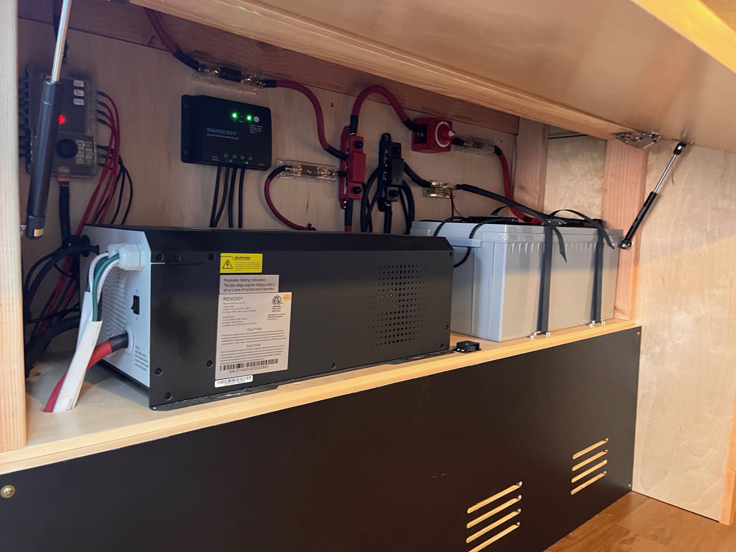 The electrical system is comprised of a 2000-watt inverter charger with shore power capability, 200 Ah AGM battery, 200 watts of solar, and a 40 amp DC-DC charger