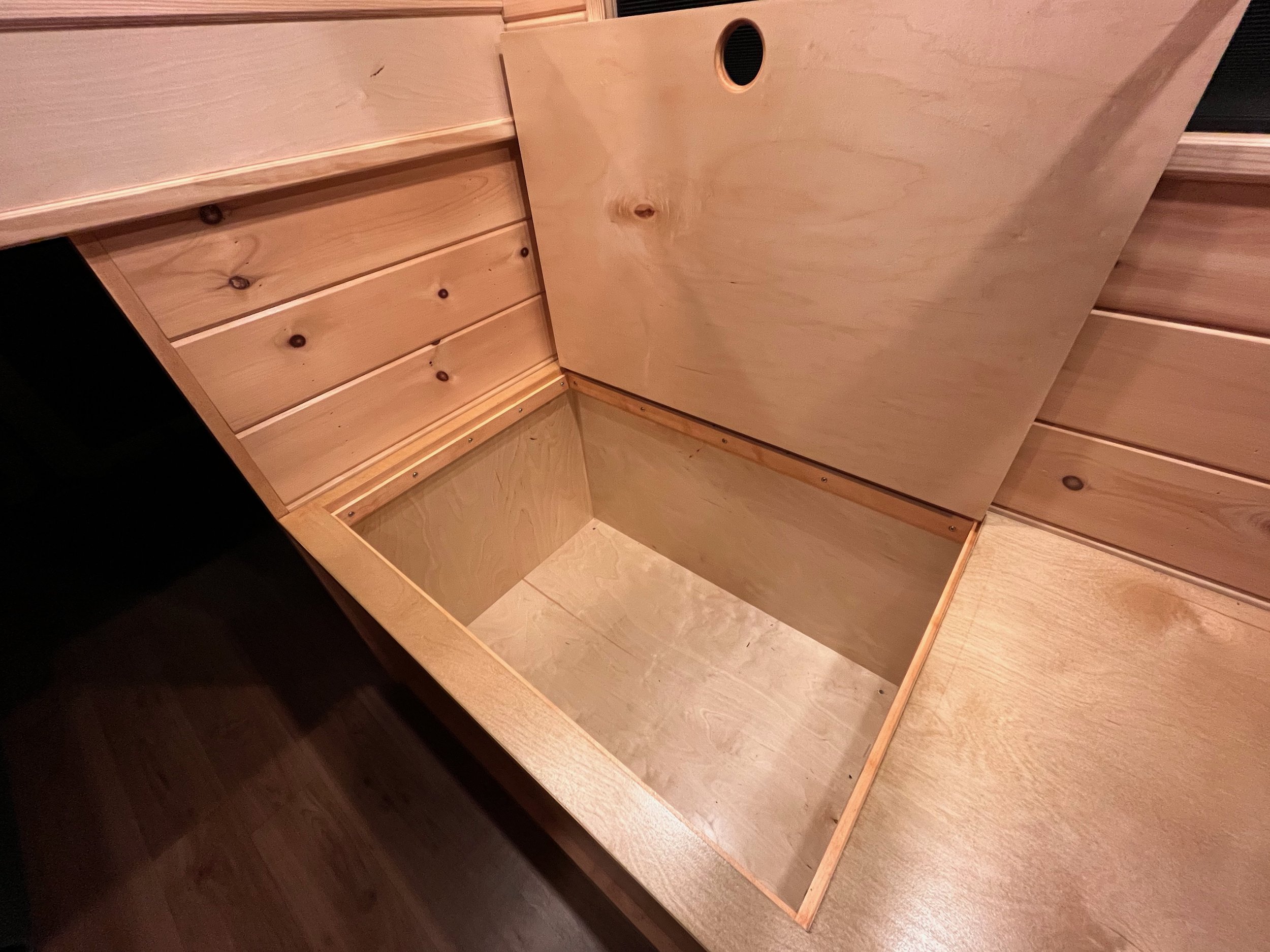 The spacious storage bin can stow away larger gear such as a camp grill or induction stove, propane tanks, window shades, or other accessories to enjoy a clutter-free environment