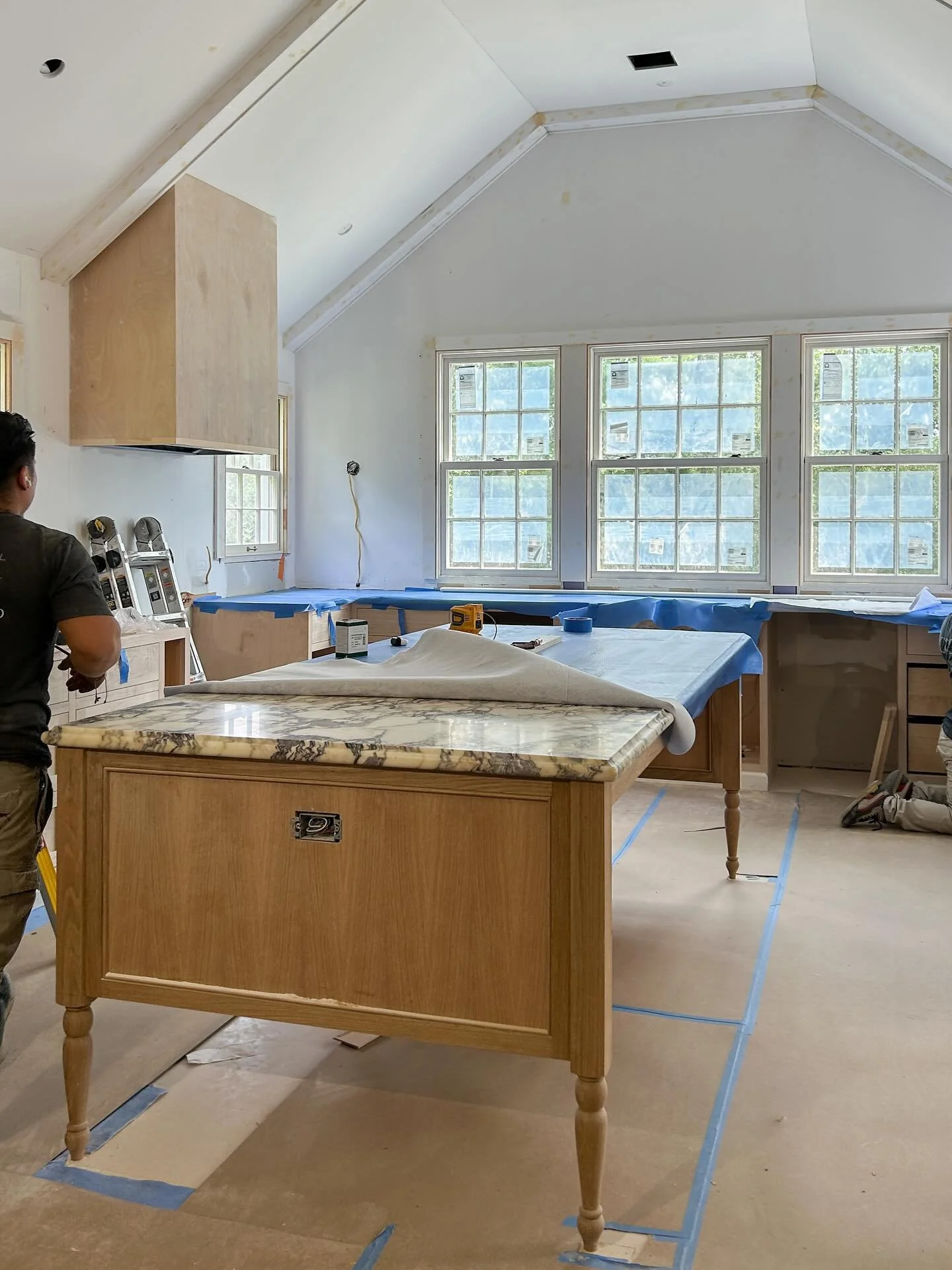 Beautiful things in progress at our Weston CT project! The custom solid wood oak island with the stunning Monet marble stone slab is such a centerpiece in the kitchen. Every detail is considered to the 1/16&rdquo;. The legs are custom turned accordin