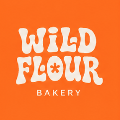 Wild Flour Bakery logo with white text on an orange background.