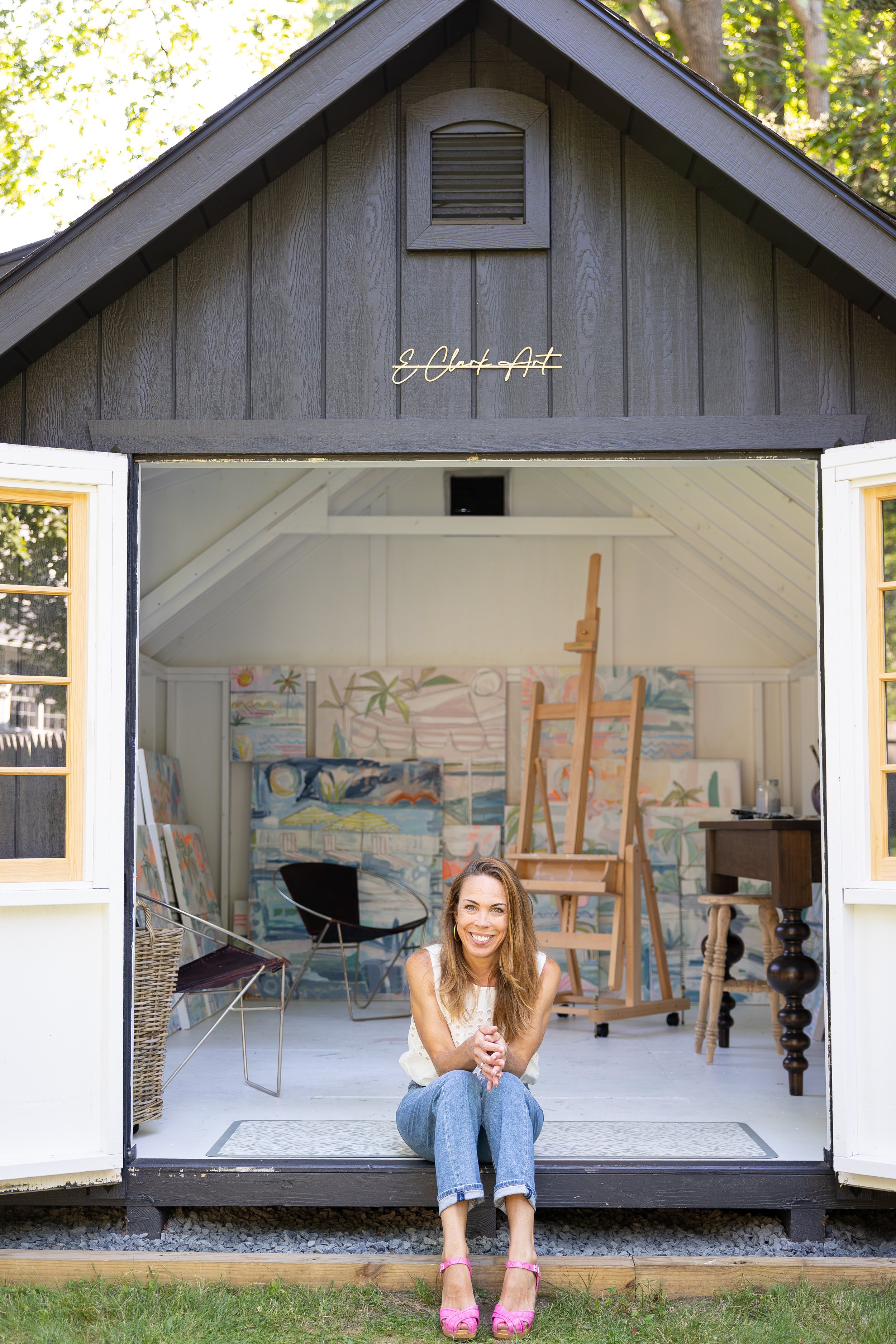 Erin Clark sitting in her coastal Massachusetts art studio.