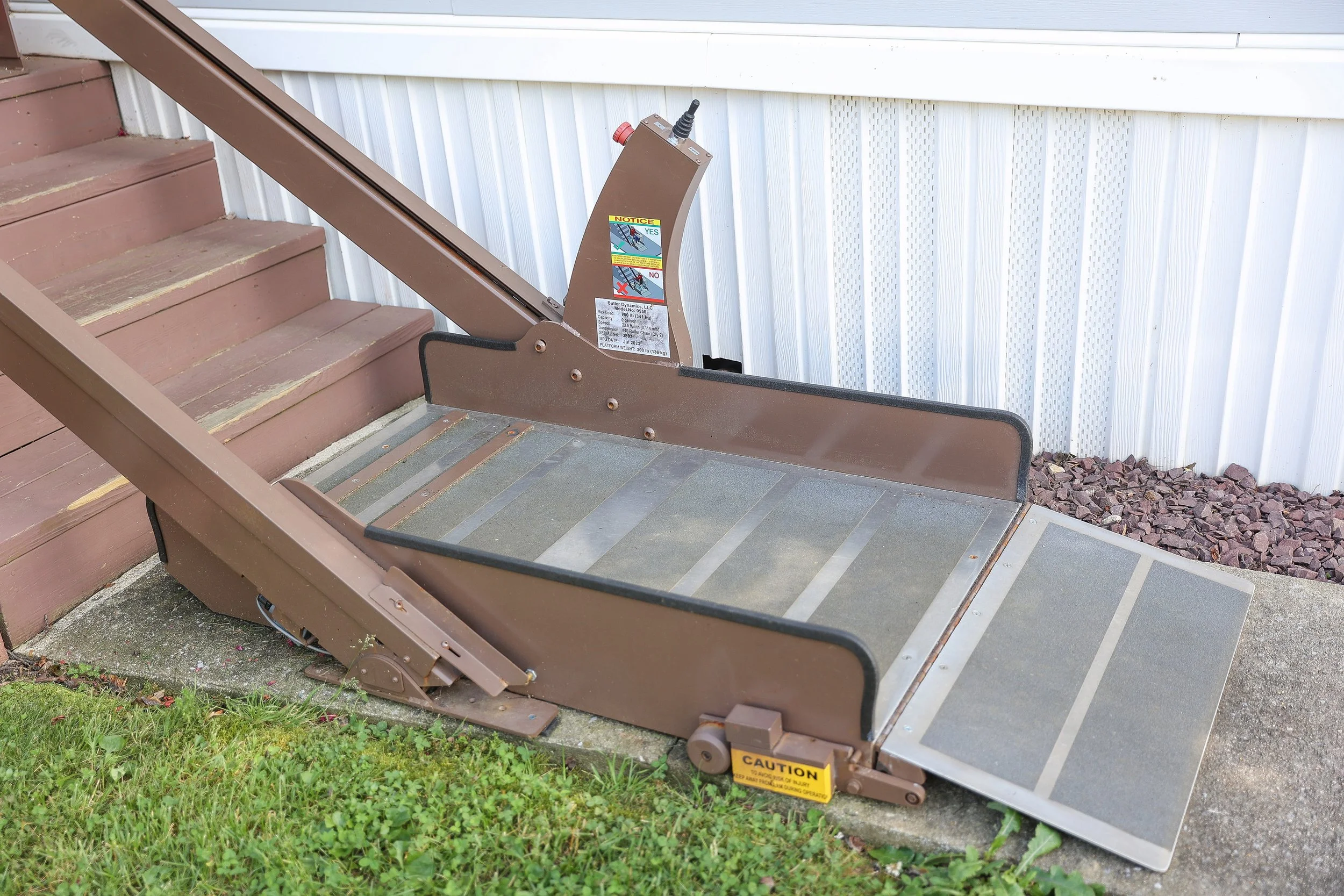 Butler Mobility Inclined Platform Lift Outdoor installed in a Residential Home