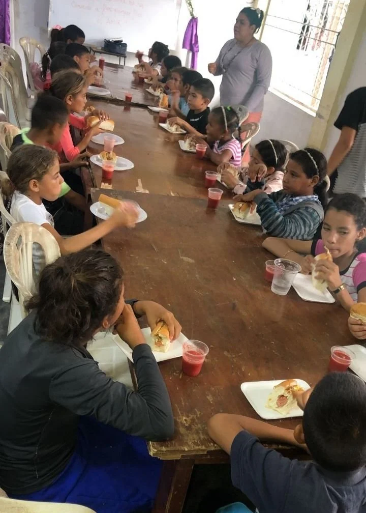 Kids enjoying a delicious meal.