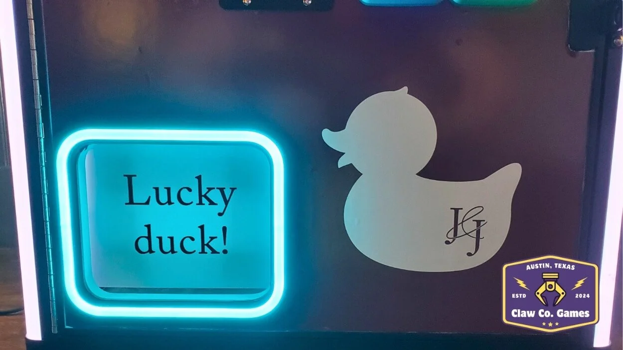 The customer requested a rubber duck theme for the custom vinyl wrap and the prizes.