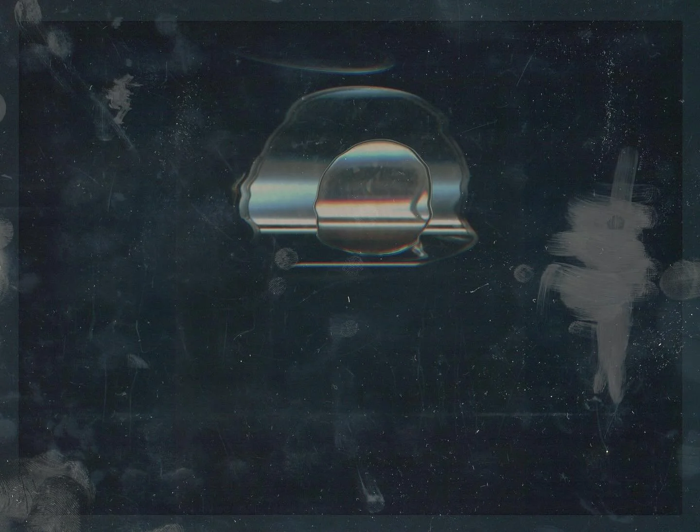 Photographic scan of mirror and magnifying glass rescanned through a screen, 2024