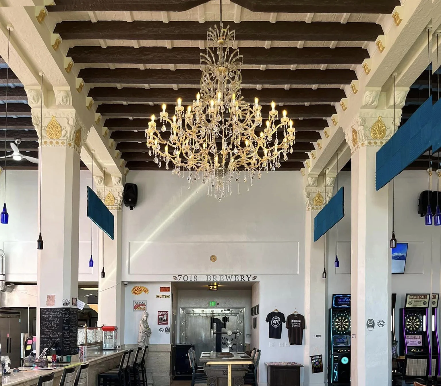 An elegant imported Italian chandelier graces  the first floor of the Henderson Bank Building.
