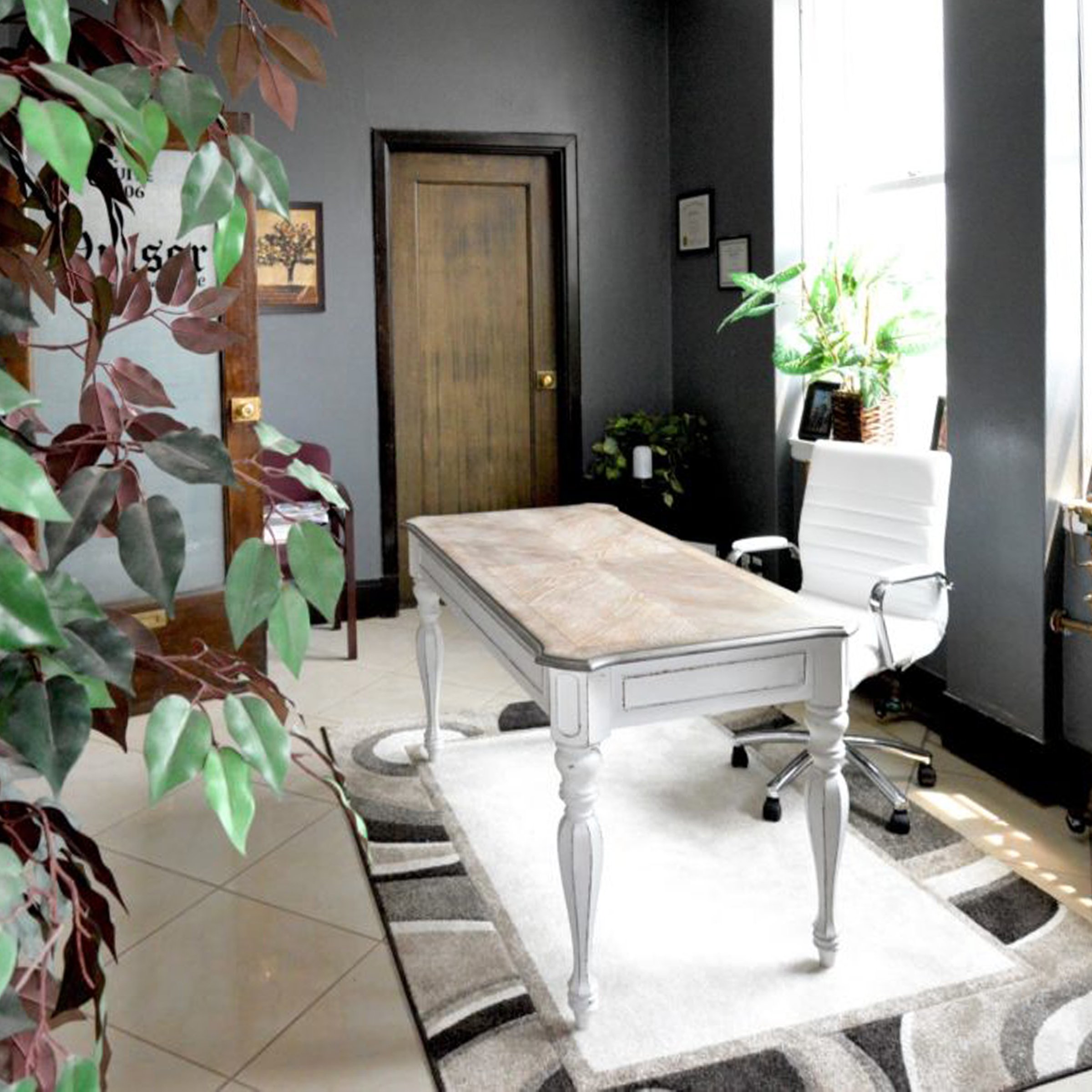 A decorated office space in the Henderson Bank Building.