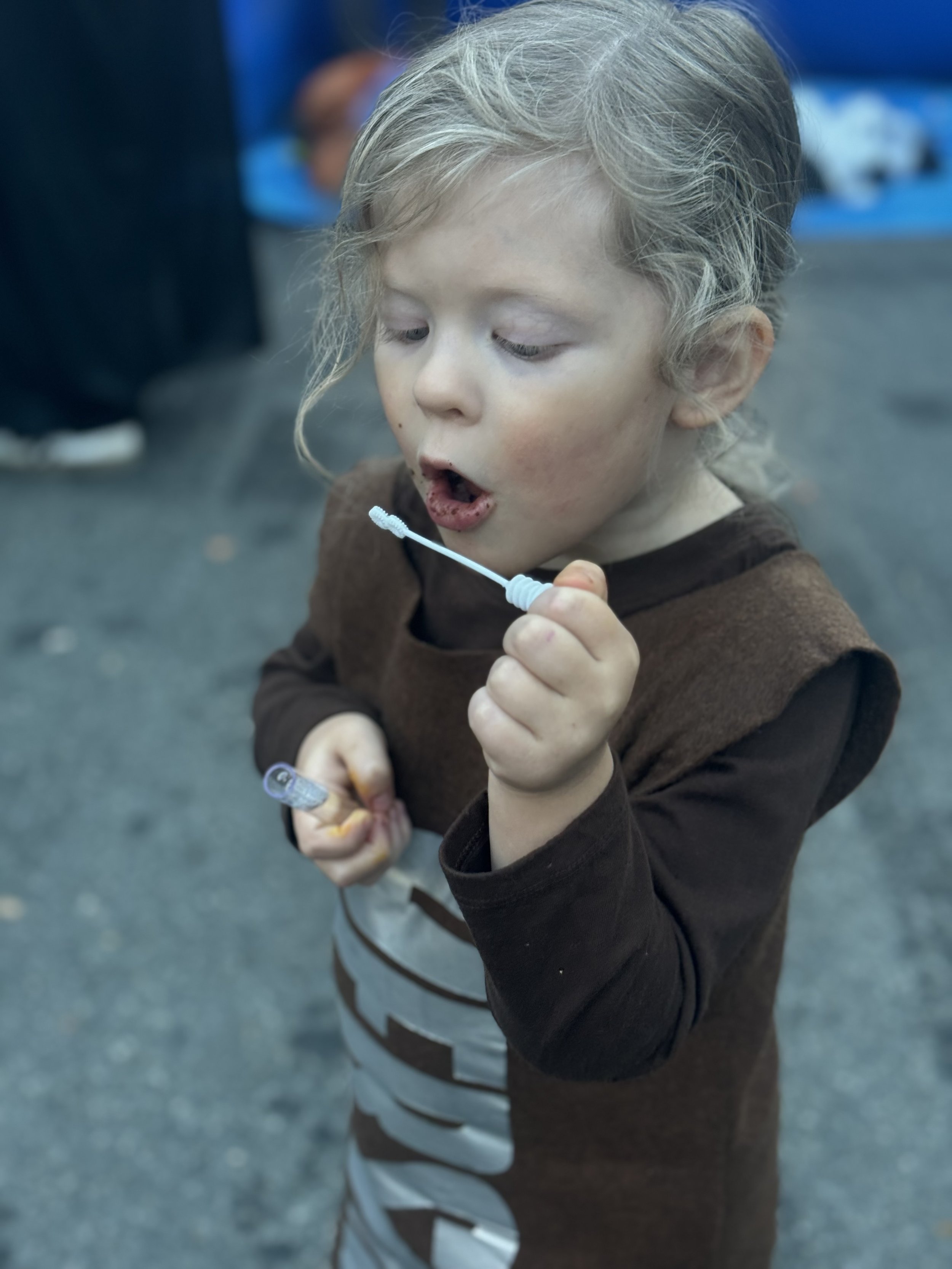 Little Hershey's bar blowing bubbles near Halloween