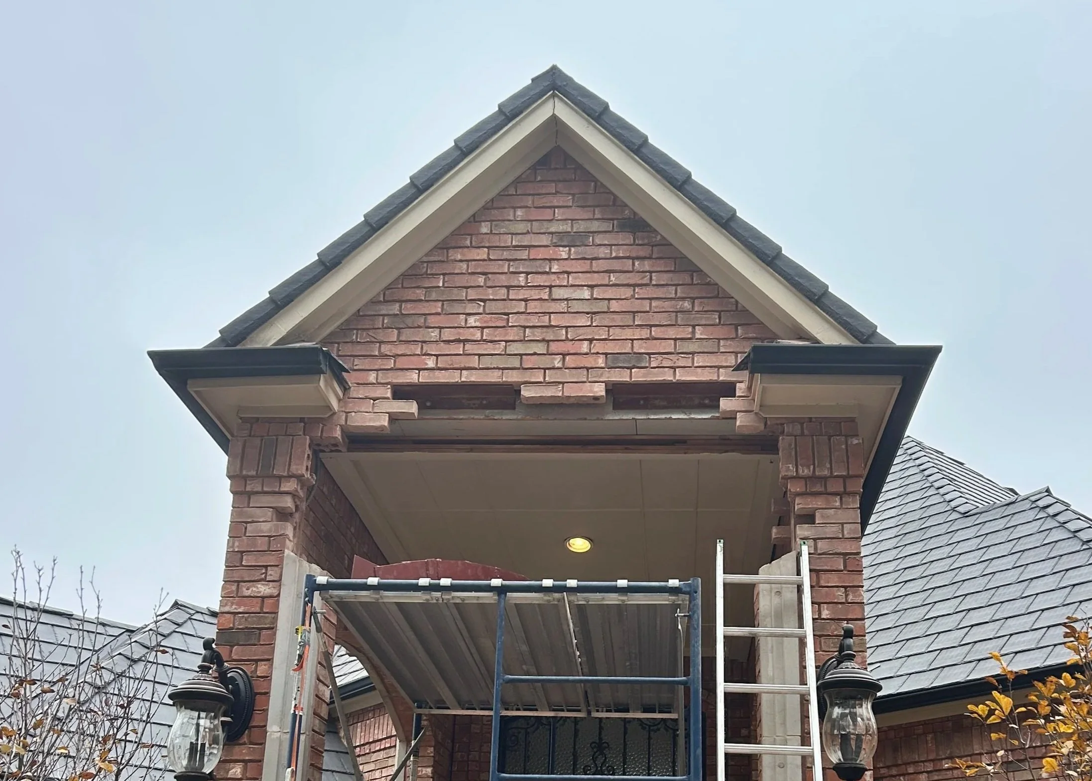 Brick archway removed for structural steel support and masonry reconstruction