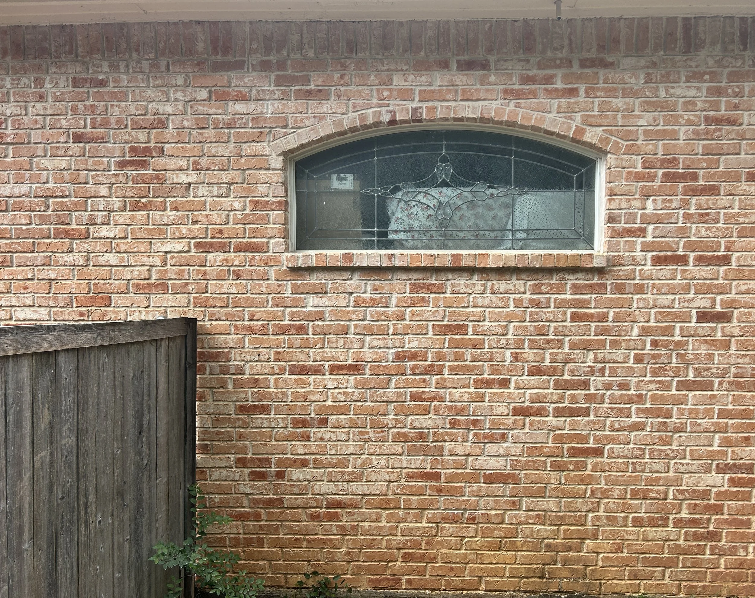 This project involved extensive structural crack repair, replacement of damaged brick, and professional tuckpointing throughout the affected area. Failed mortar joints were carefully removed and repointed with color-matched mortar within reason, whil