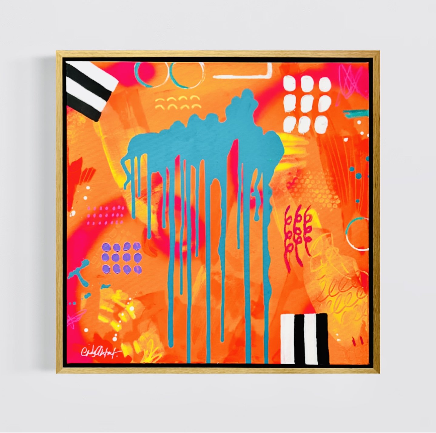 Orange and turquoise abstract wall art framed in oak wood frame