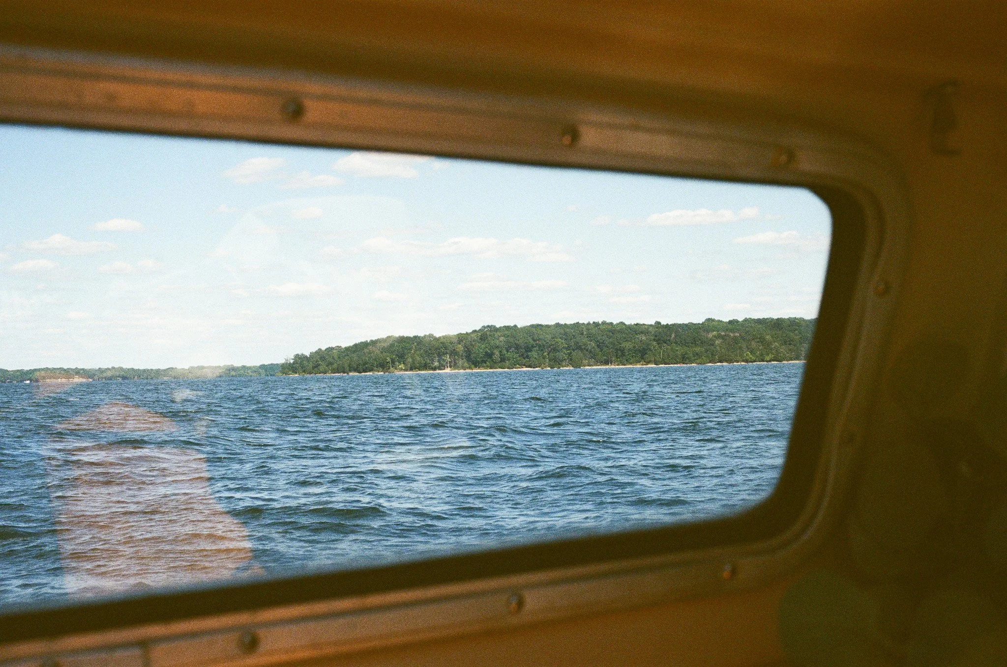 View of Percy Priest Lake from inside the cabin of the Catalina 22 boat Whippoorwill.
