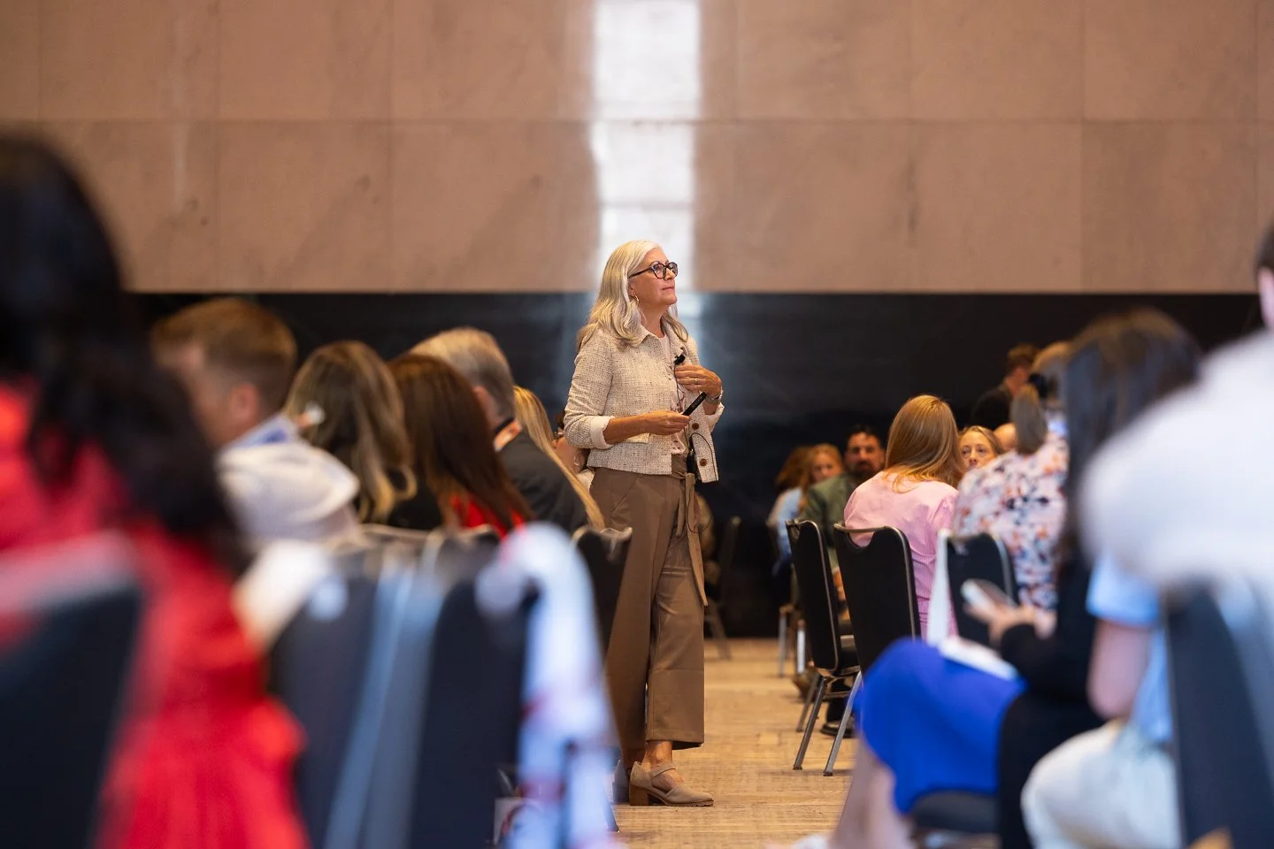 Melanie Booth presenting a keynote workshop at Suitable conference