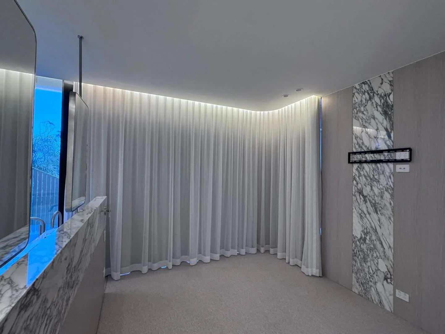 There&rsquo;s something about sheer curtains that instantly gives a bathroom that luxe, finished feel.

We recently installed these beautiful floor-to-ceiling sheers, and paired with the soft LED lighting around the ceiling, they completely transform
