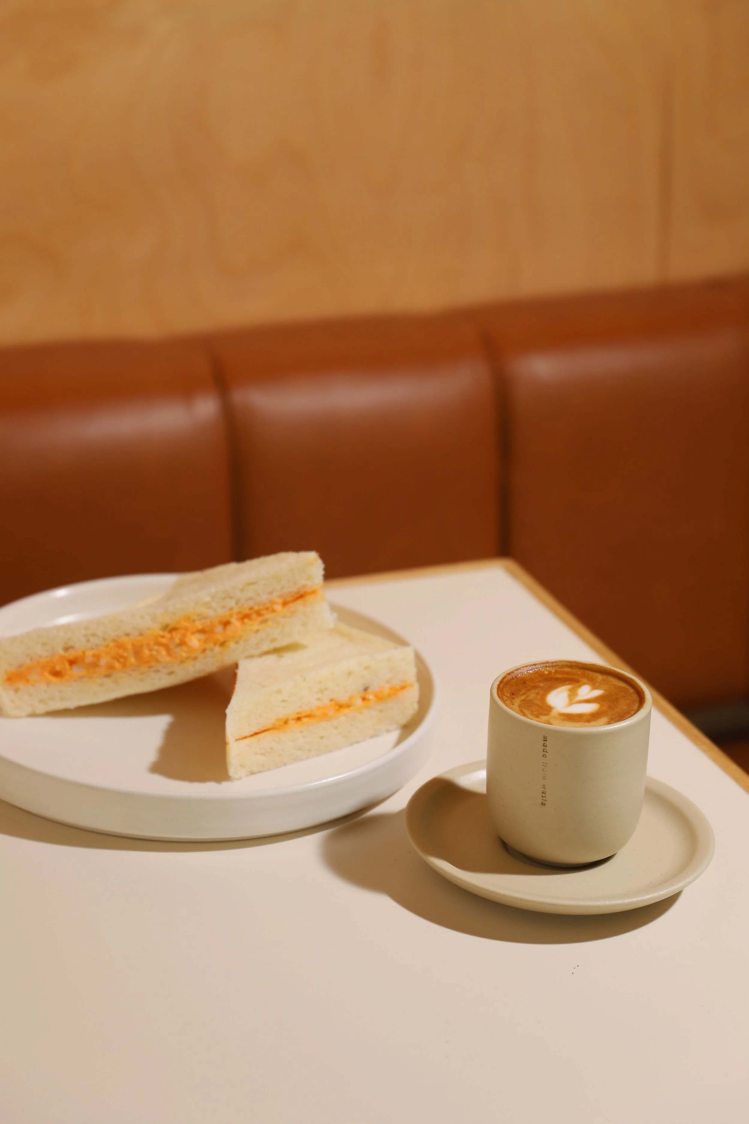Raw breakfast package, egg sandwich and coffee