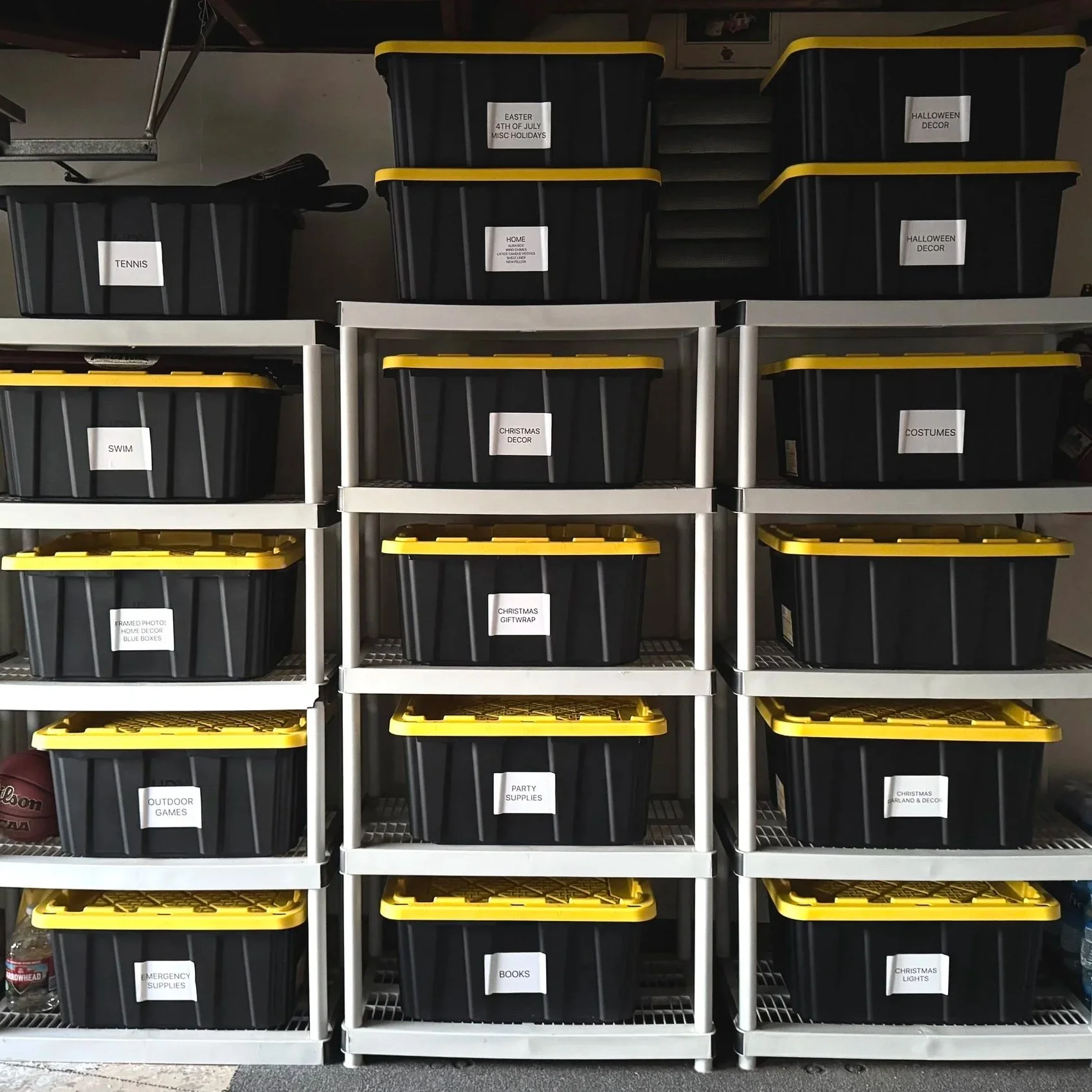 organized garage shelving labeled bin