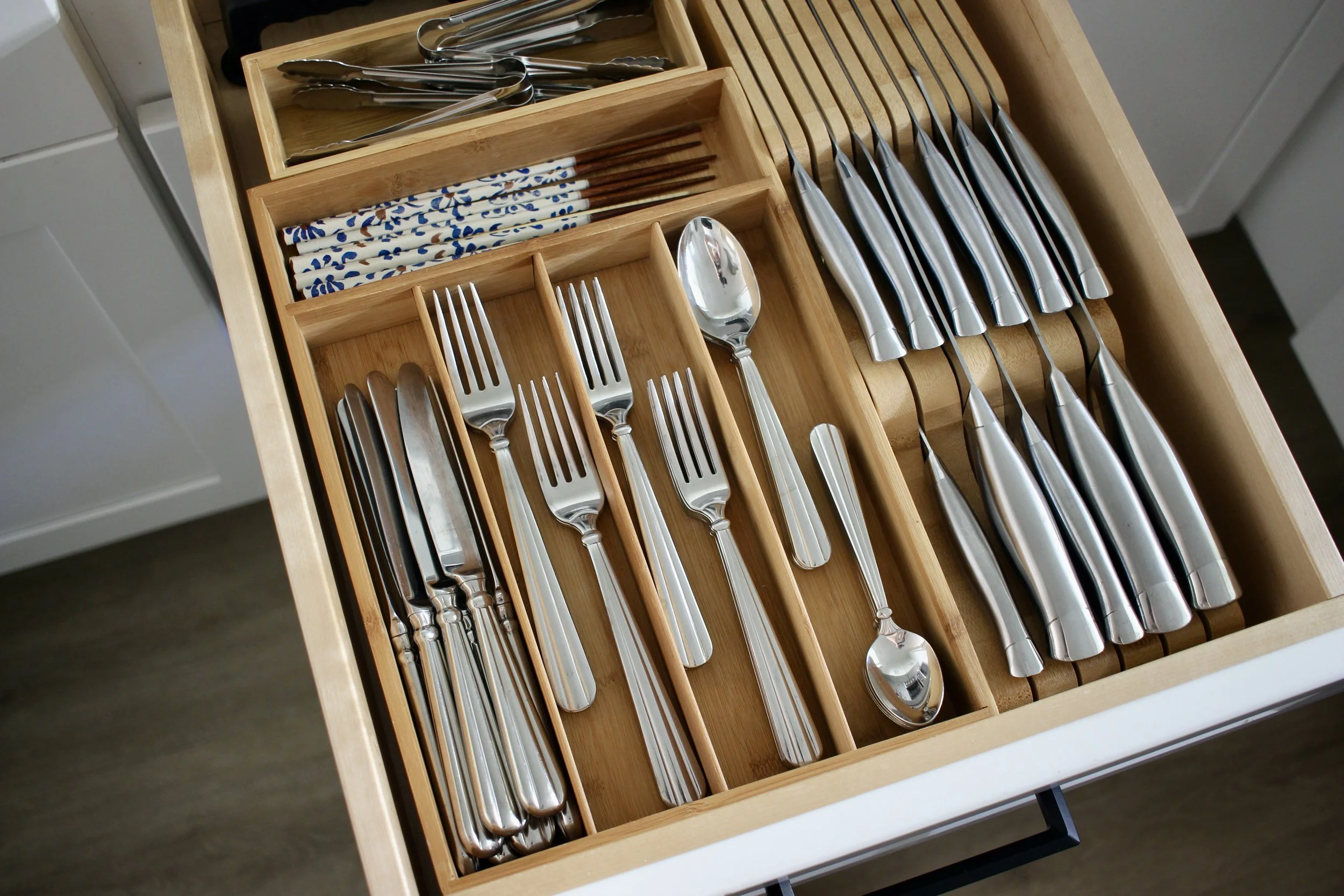 organized kitchen silverware drawer