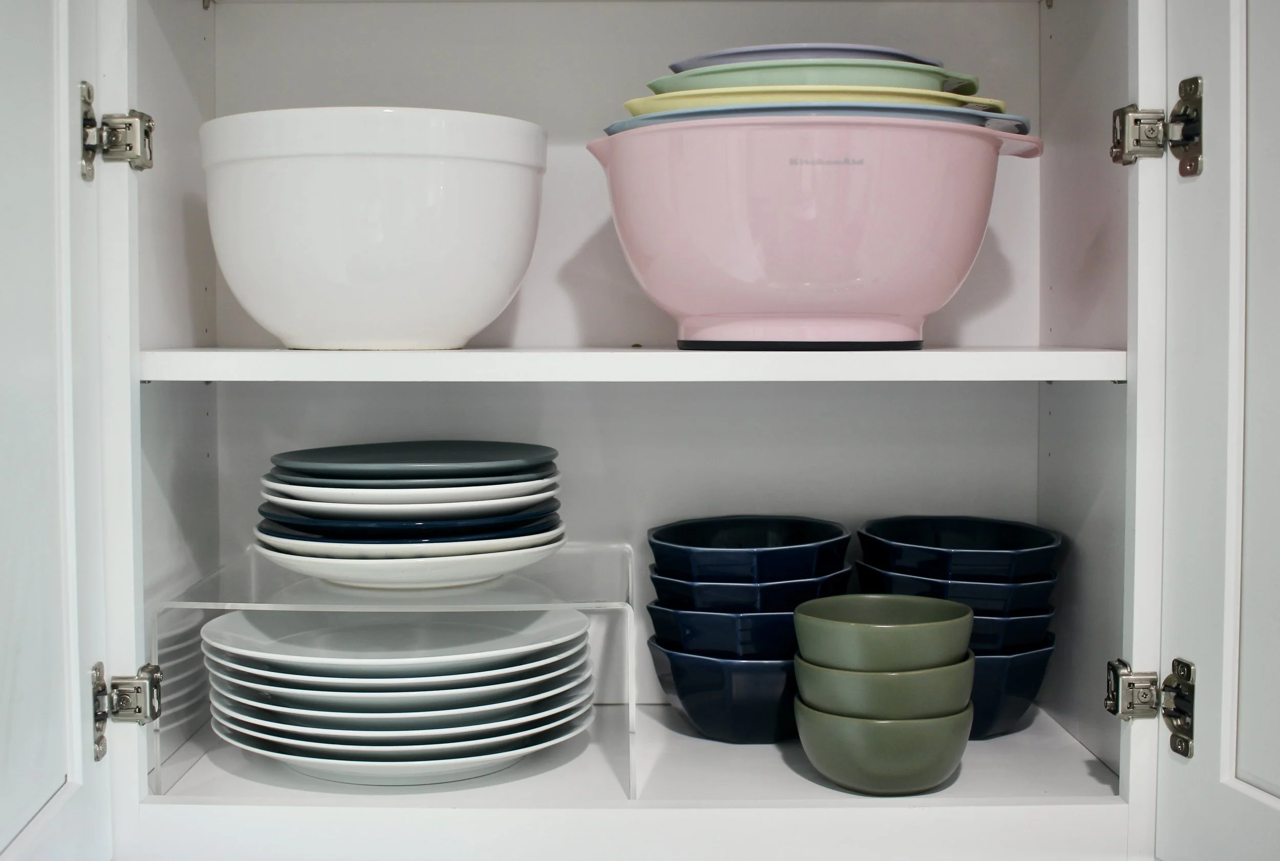 organized kitchen dishes cabinet shelves