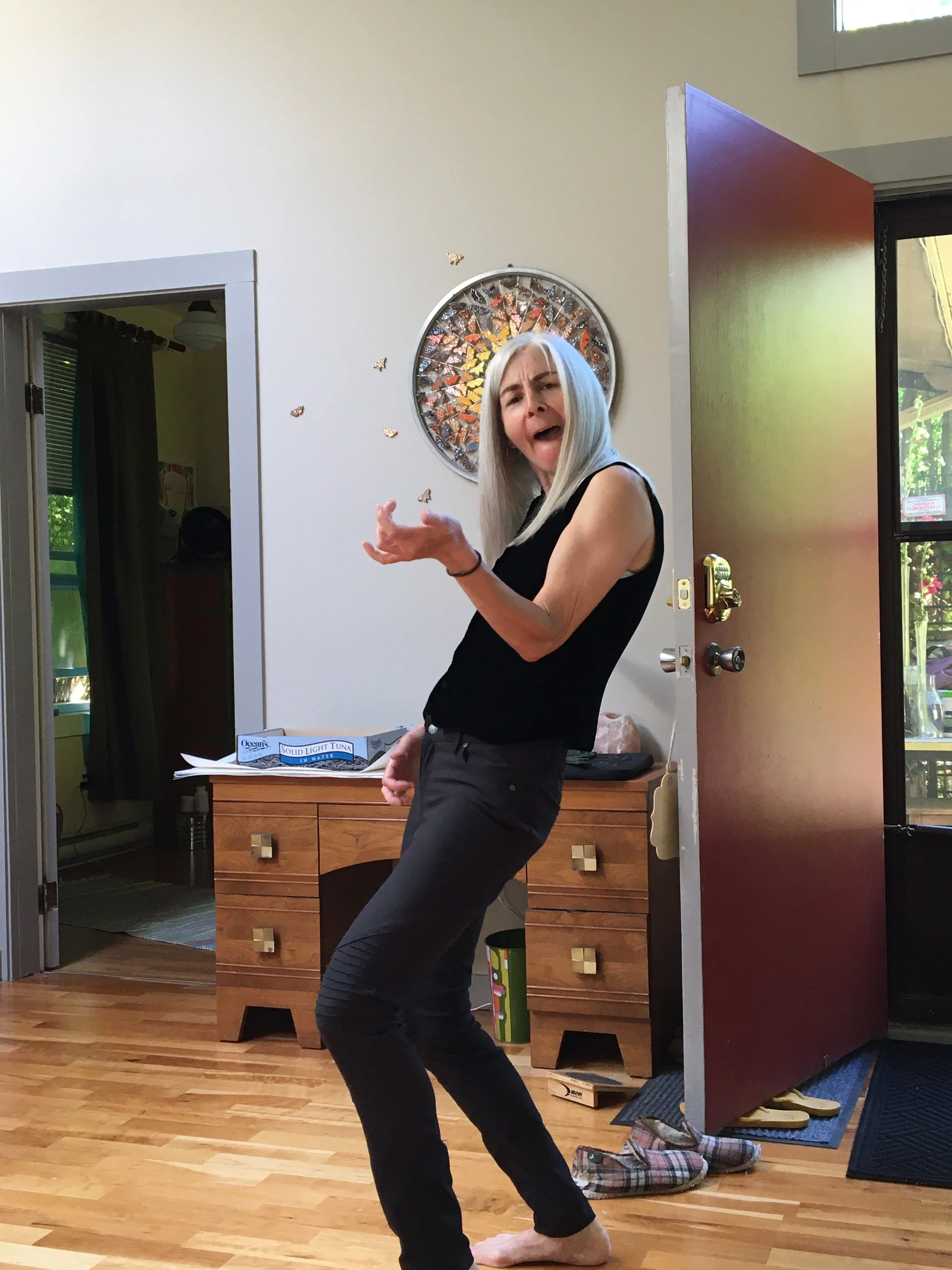 The artist doing some air guitar