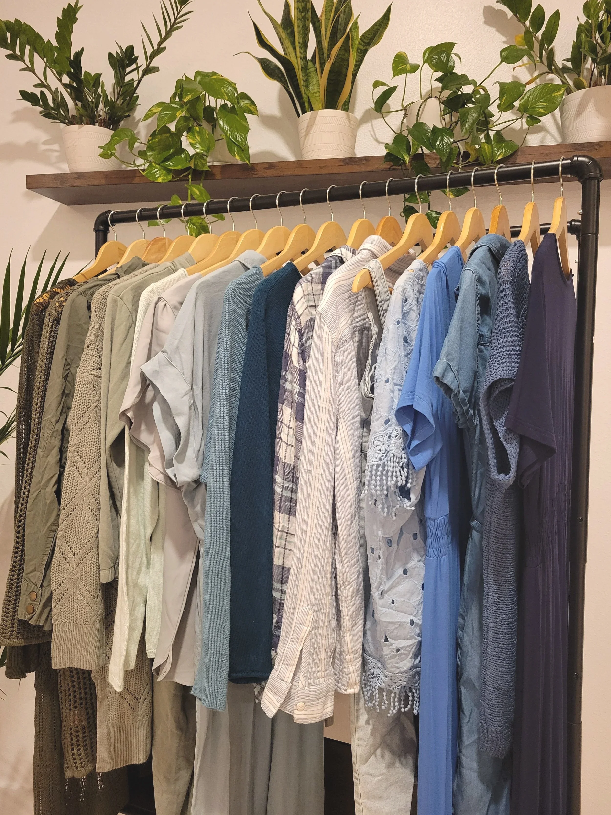 Clothing rack setup for a pop-up shop at Oasis Events Collective in Sarasota Florida