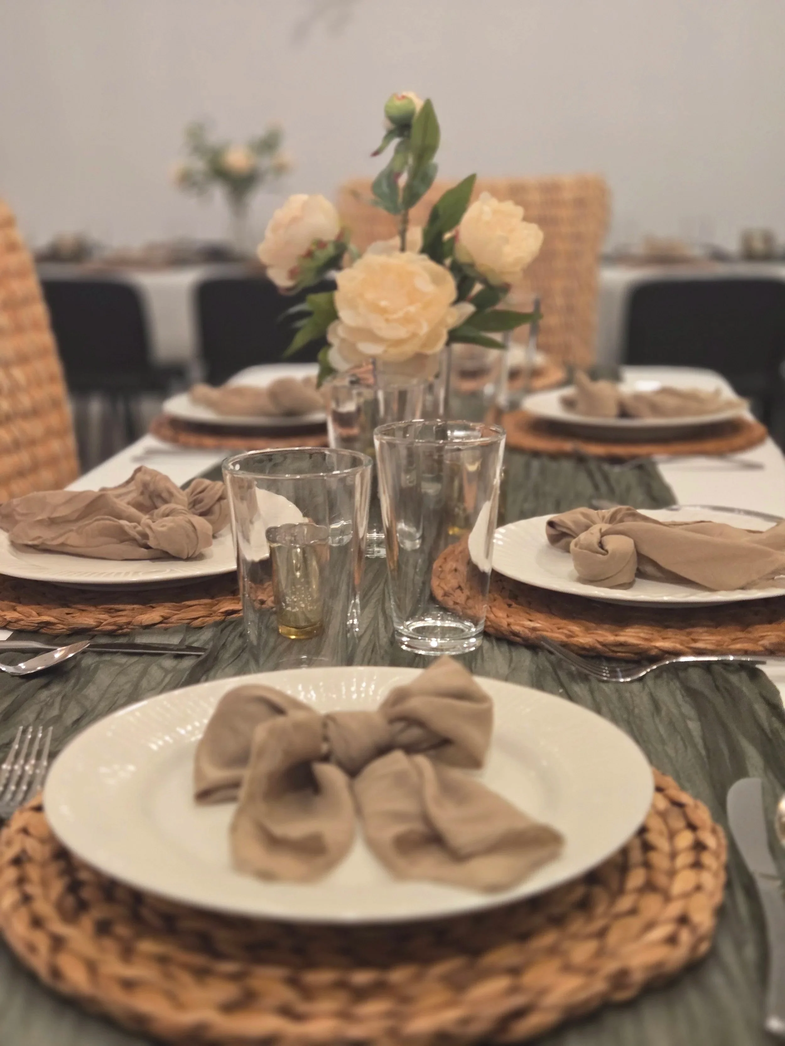 A full table setting at Oasis Events Collective in Sarasota Florida.  A cozy, intimate venue for baby showers, bridal showers, corporate meetings and end-of-life celebrations near Parrish, Venice and Lido Key.