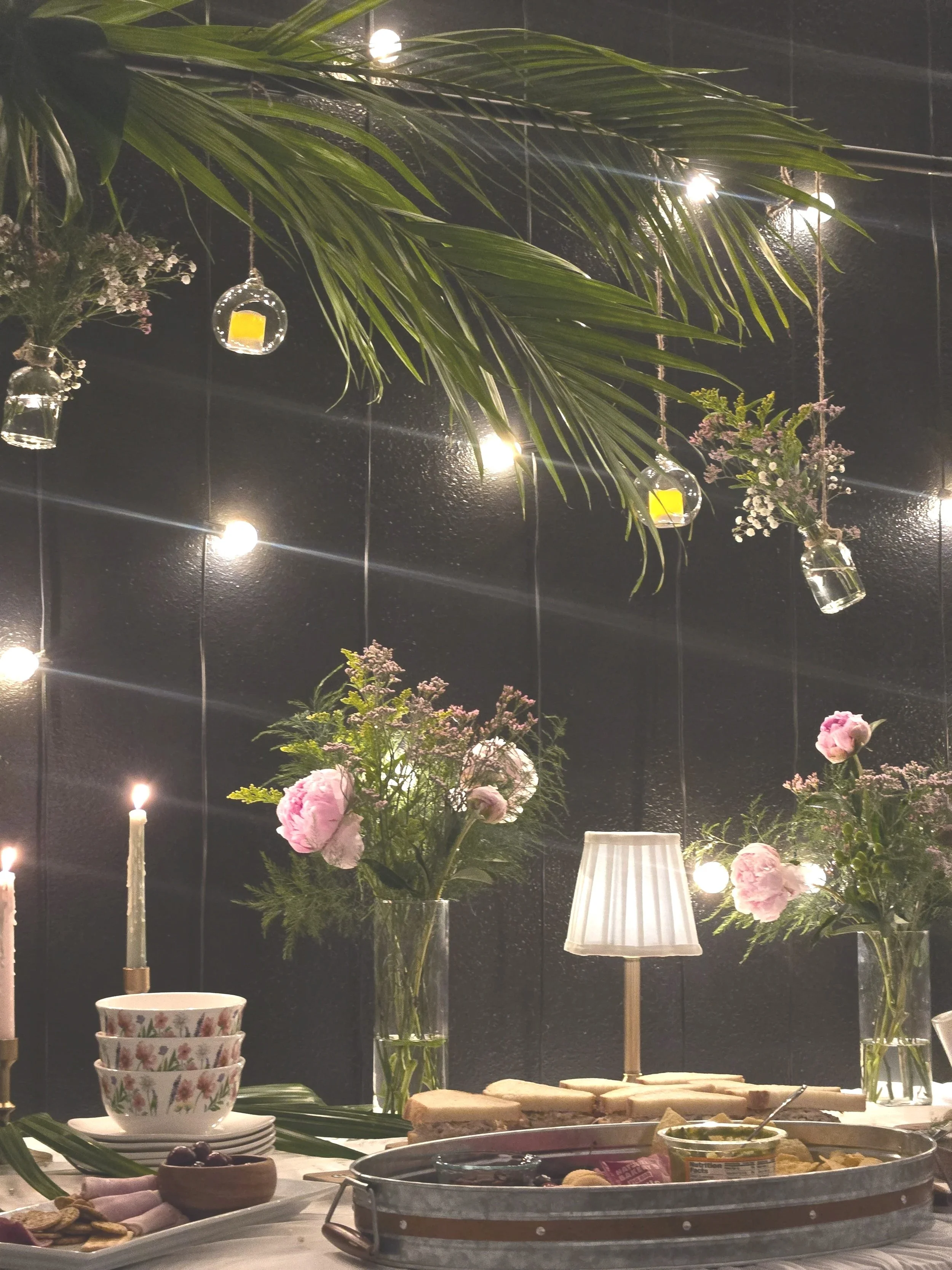 Candles and food at Oasis Events Collective in Sarasota Florida.  A family owned , cozy venue that is perfect for babys showers, bridal showers, corporate events and birthday parties.  Serving Bradenton, Parrish and Lakewood Ranch