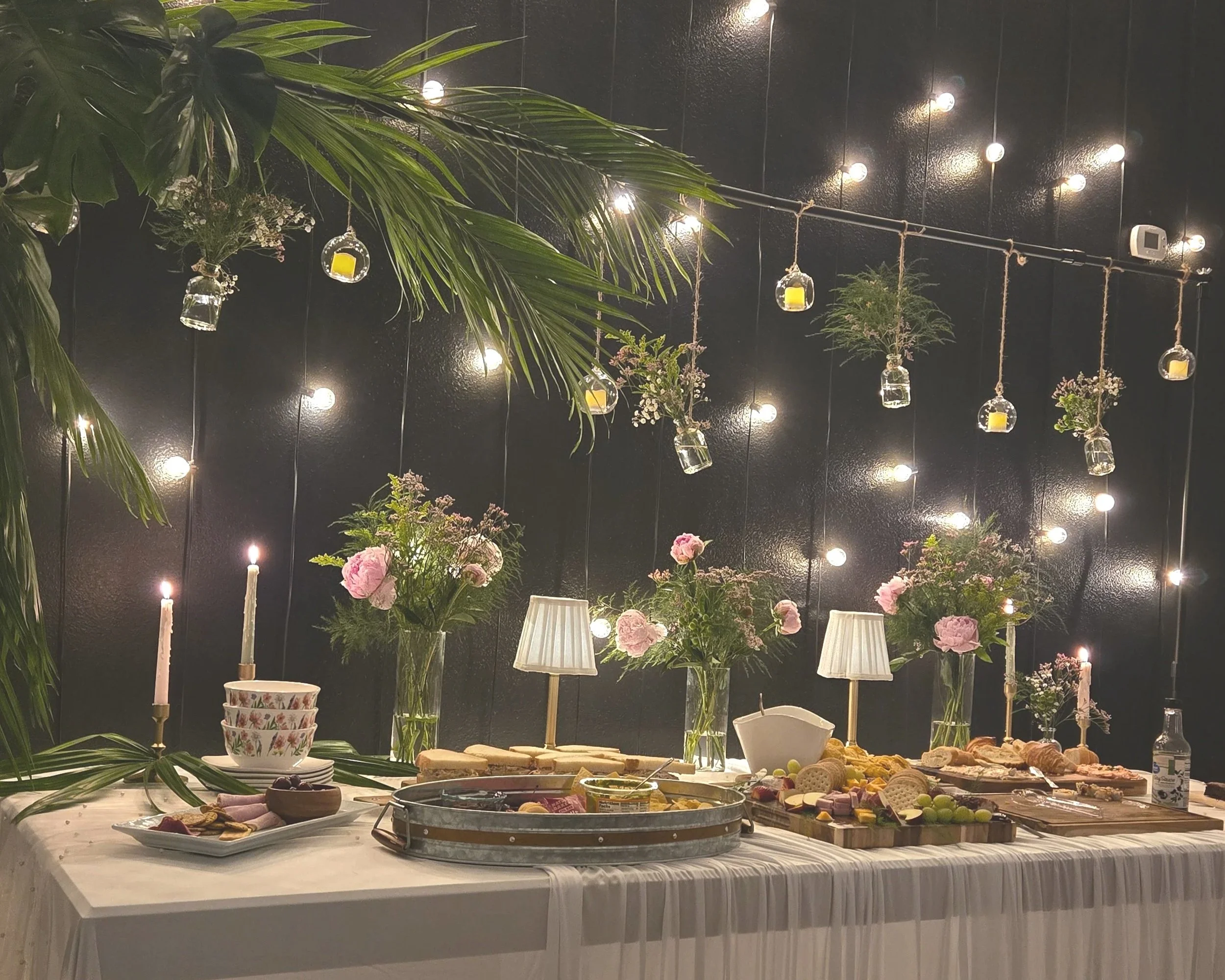 Buffet table with food at Oasis Collective in Sarasota Florida.  A family-owned event venue near Myakka City, Parrish, Bradenton and Lakewood Ranch.  Cozy venue for baby showers, bridal showers, rehearsal dinners, and gender reveals.  Also perfect fo