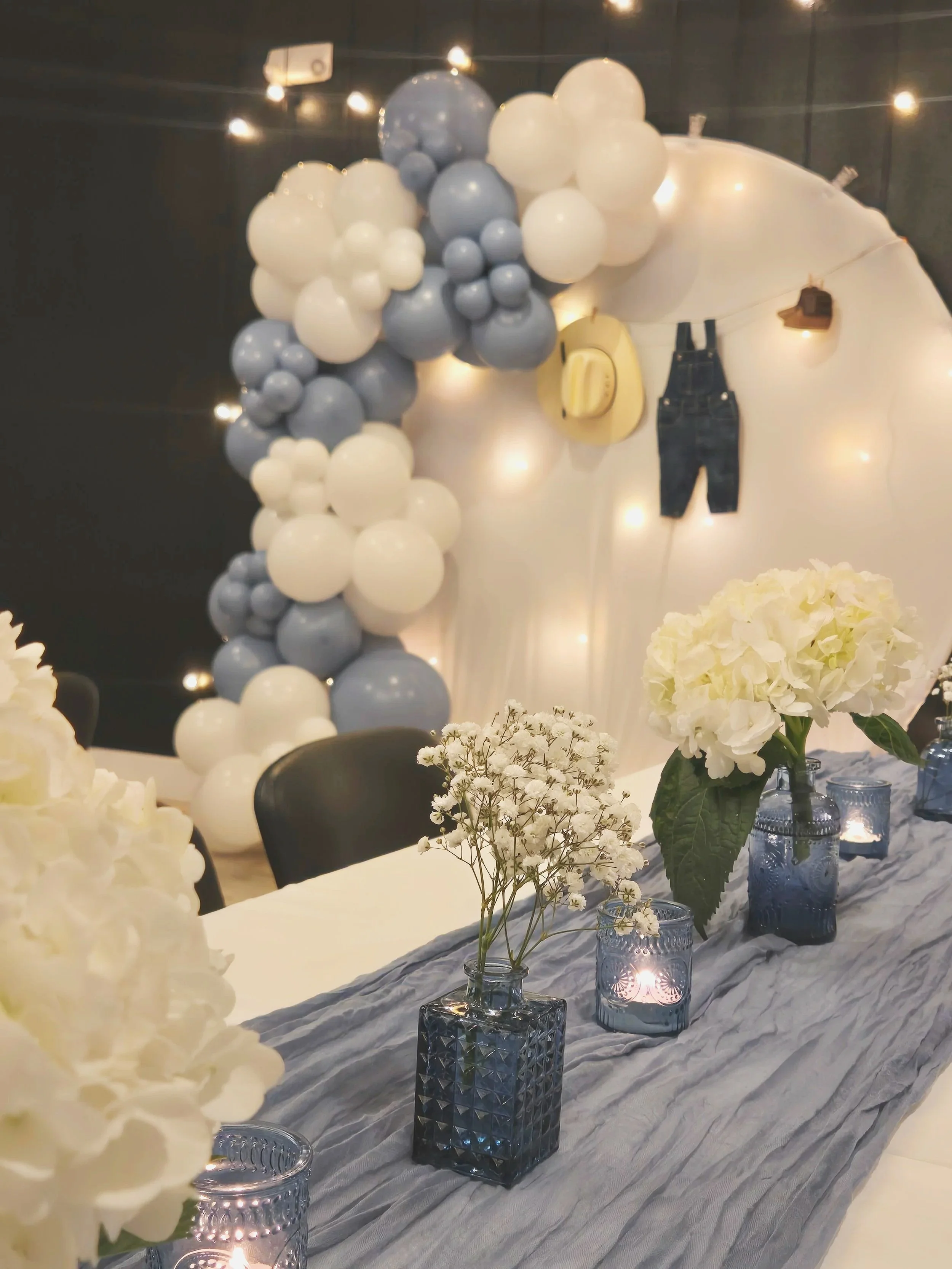 Balloon arch at a baby shower at Oasis Collective in Sarasota, Florida.  A small, cozy venue near Bradenton, Parrish, and Venice.  Perfect venue for graduation parties, rehearsal dinners, and baby showers