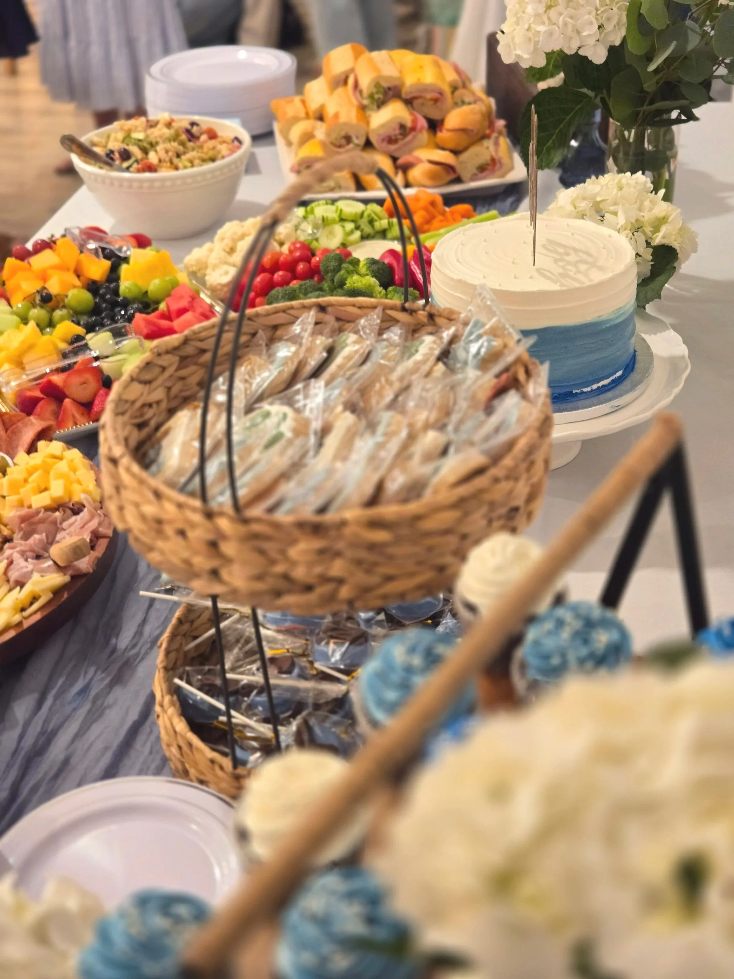 Display of food at a baby shower at Oasis Events Collective in Sarasota FL.  A customizable event venue for bridal showers, engagement parties, birthday parties and gender reveals.  Located near Lakewood Ranch, Parrish, and Venice