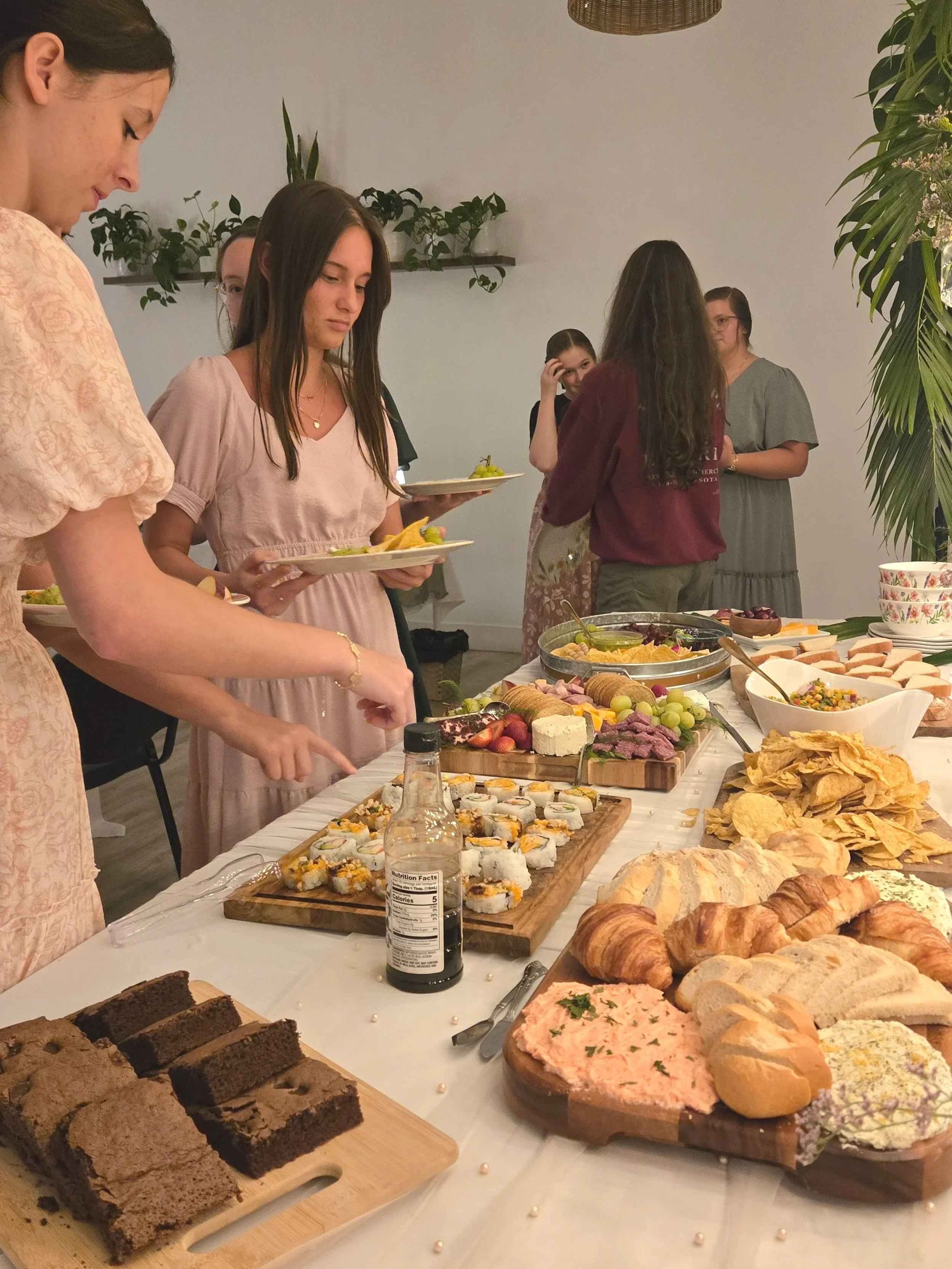 Food om buffet table at Oasis Events Collective in Sarasota FL.  An intimate venue for baby showers, bridal showers, networking events, and micro weddings .  Near Lido Beach , Siesta Key and Bradenton
