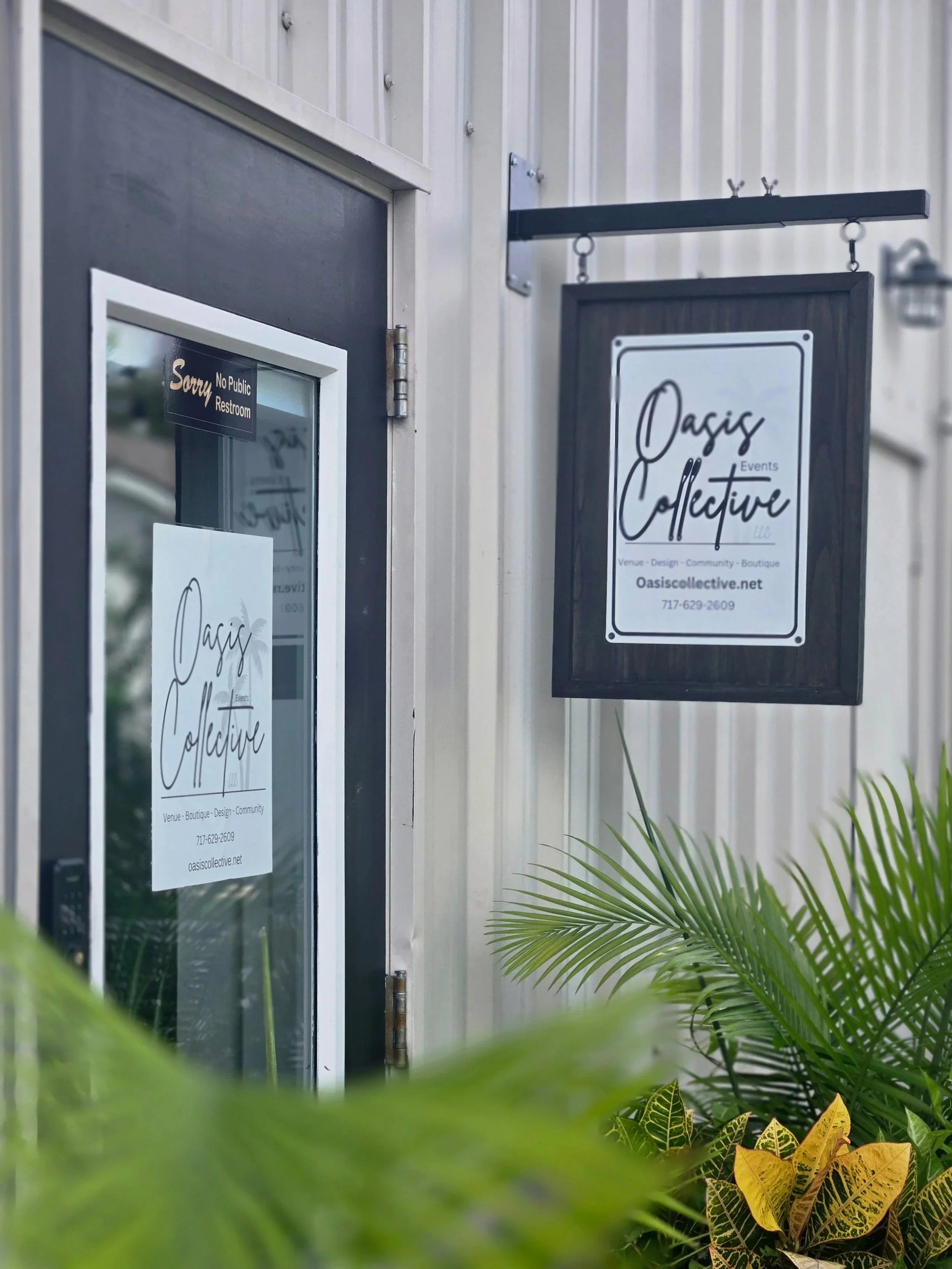 Oasis Event Collective sign outside door of small, intimate, event venue in Sarasota FL