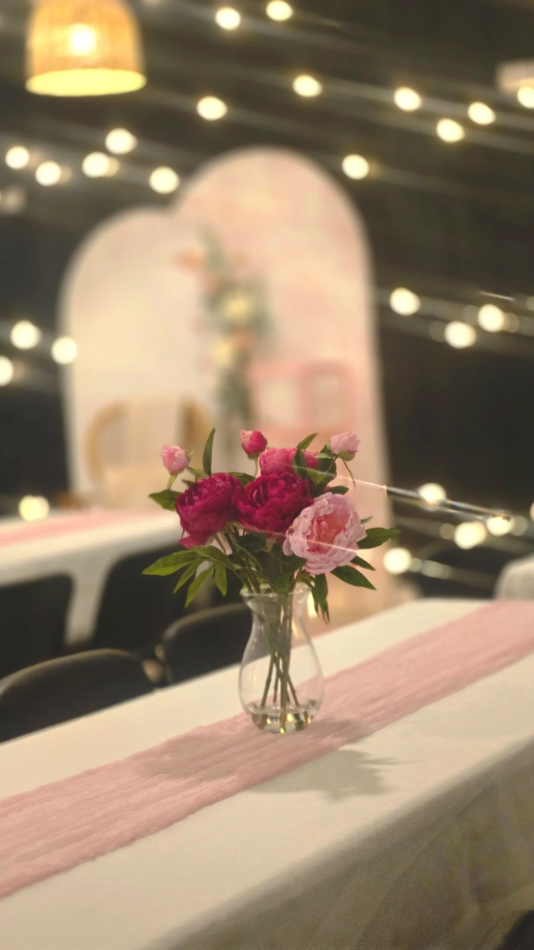 Florals, arches and table runners at a baby shower at Oasis Events Collective in Sarasota FL