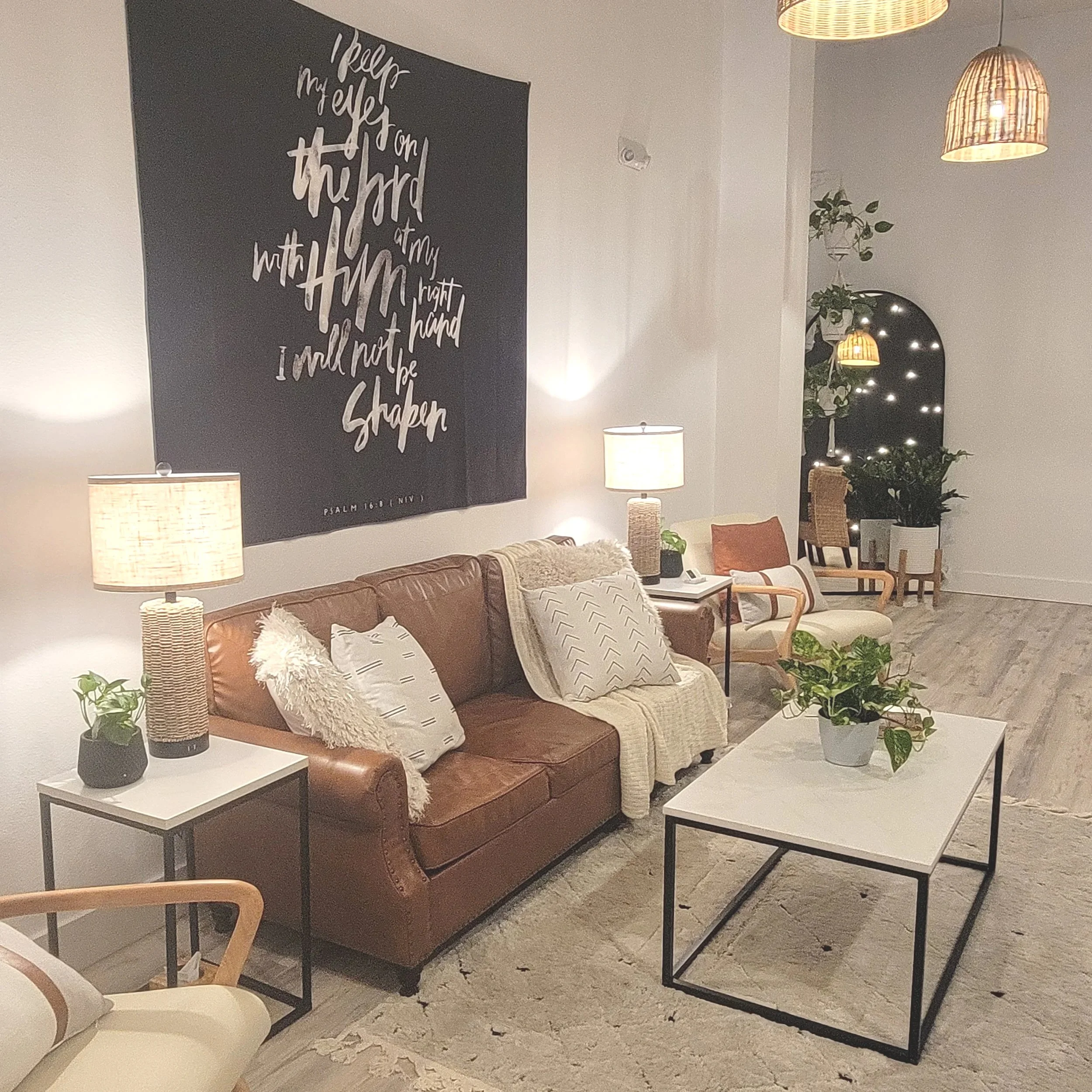 Cozy couch setting at Oasis Events Collective in Sarasota FL.  Intimate event venue for up to 40 people. Perfect for baby showers, bridal showers, gender reveals, and business meetings.  Near Bradenton and Lakewood Ranch.