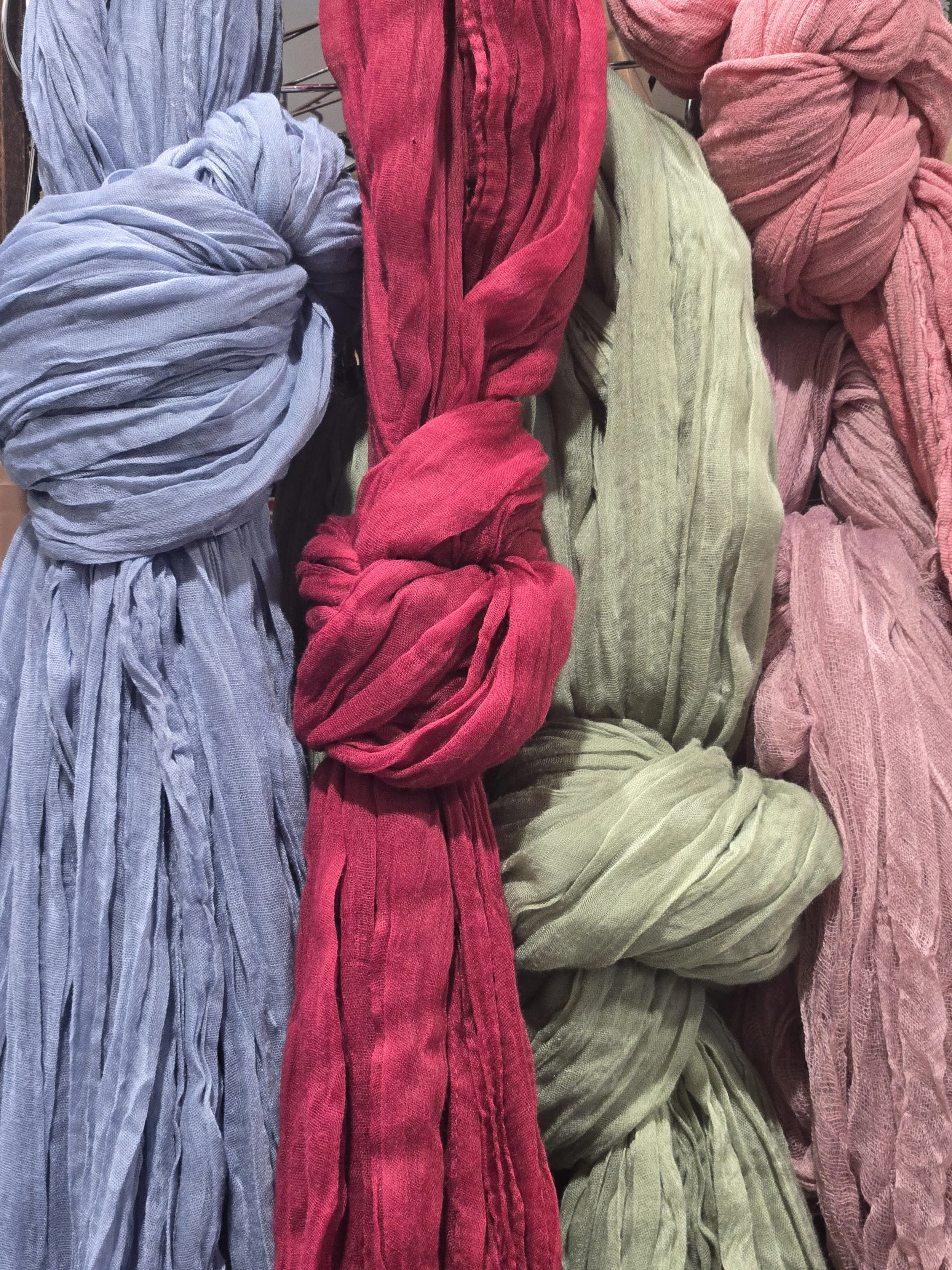 Variety of table scarves at Oasis Events Collective in Sarasota, FL. Venue for events such as baby showers, bridal showers, birthday parties, business meetings.