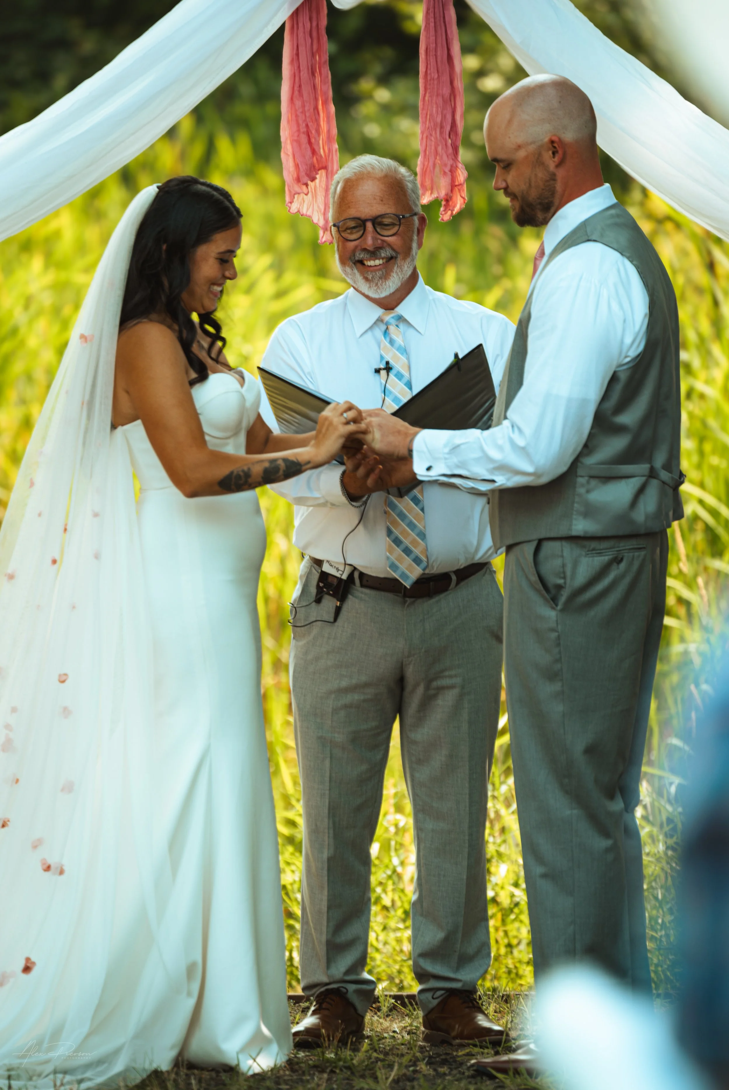 bride and groom saying vows during their wedding in Olympia, WA